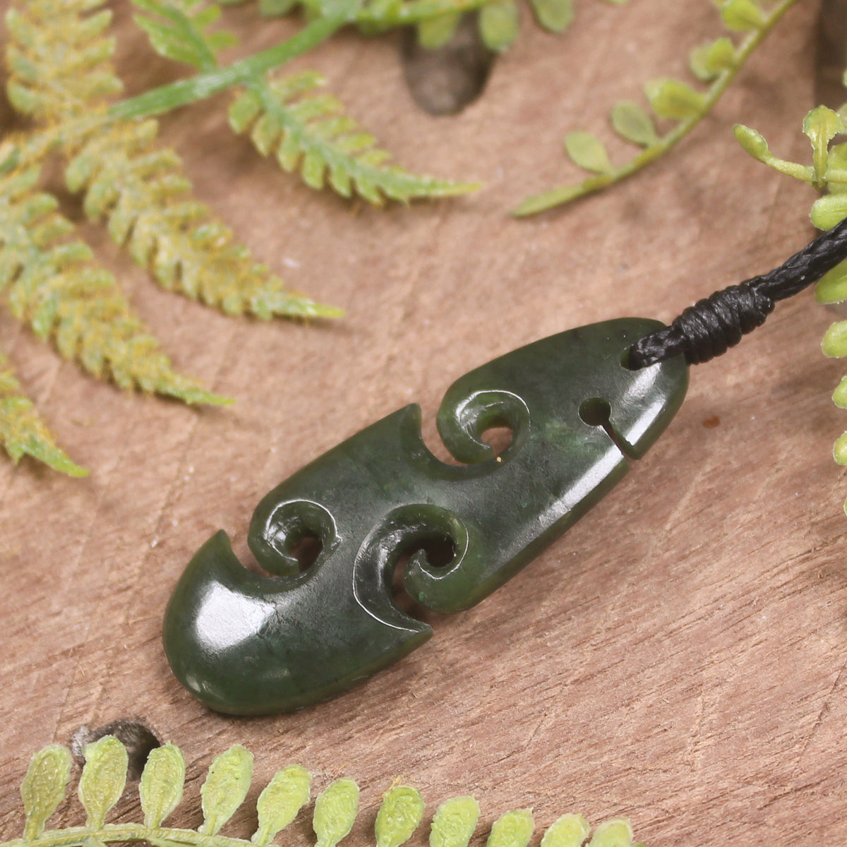 Roimata or Teardop with Koru carved from Rimu Pounamu - NZ Greenstone