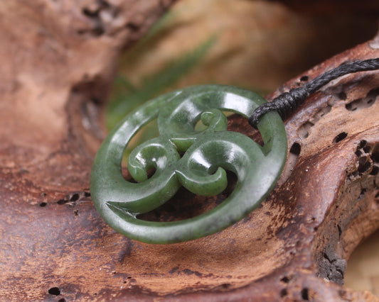 Koru carved from Rimu Pounamu - NZ Greenstone