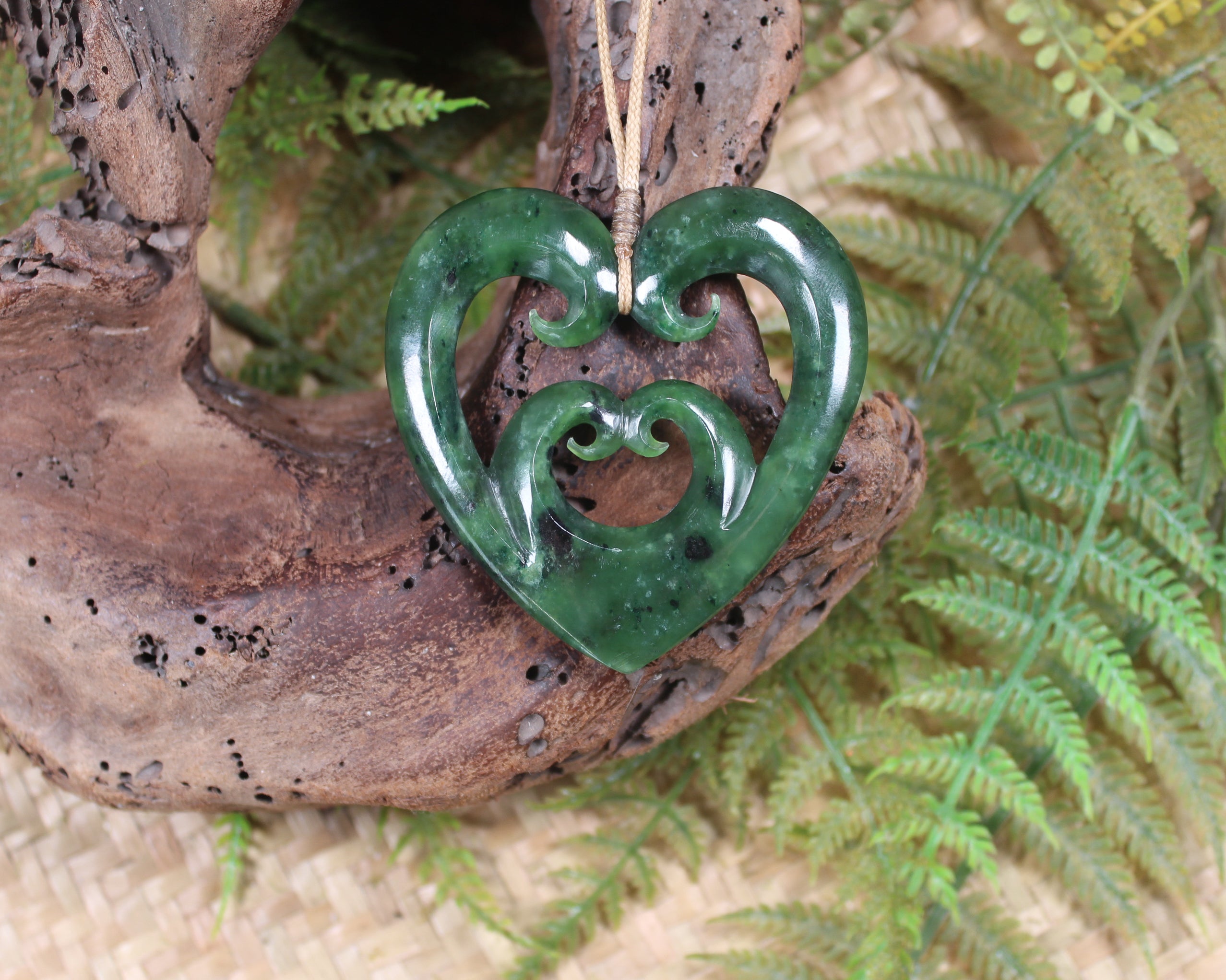 Heart with Koru carved from Rimu Pounamu - NZ Greenstone