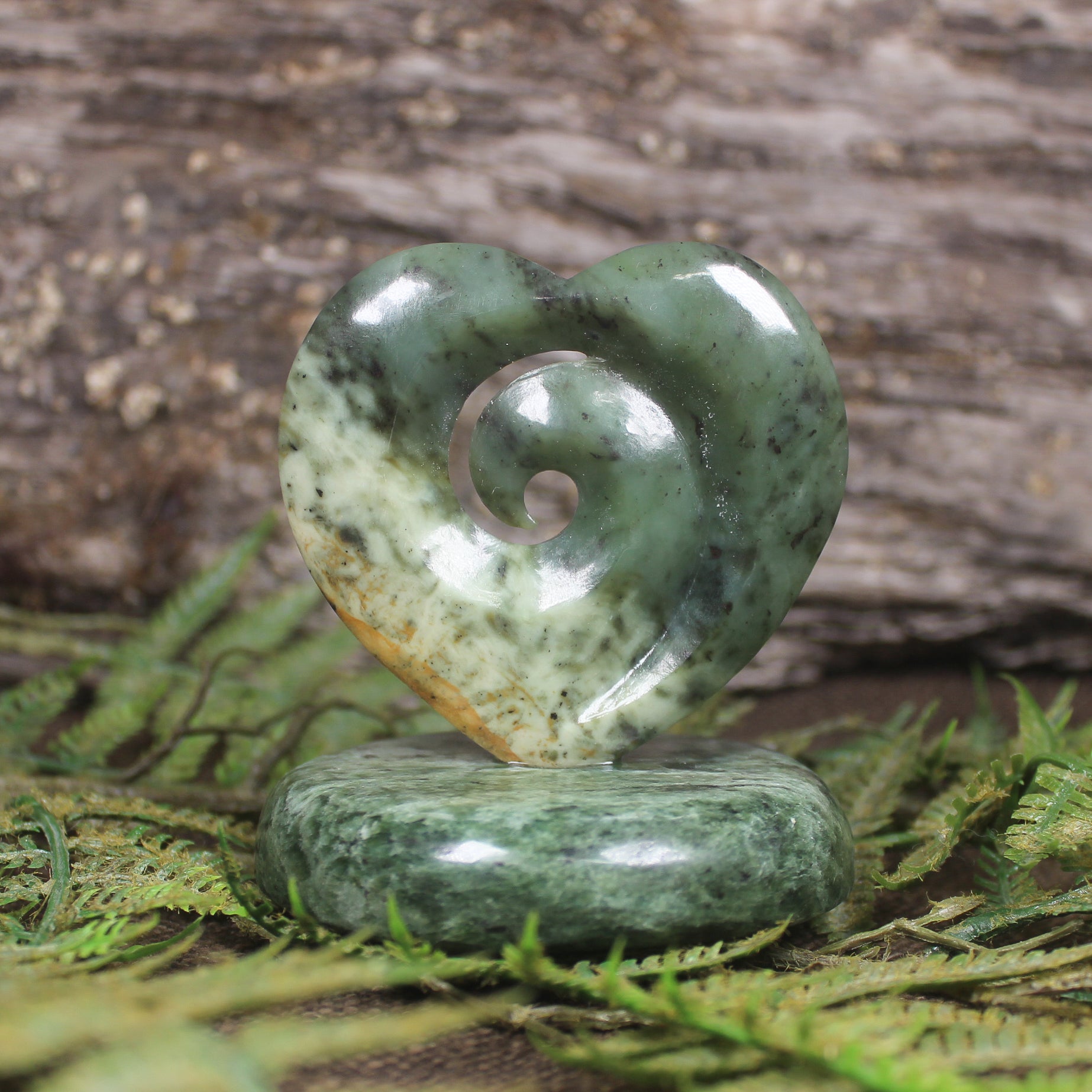 Koru heart sculpture carved from Flower Jade Pounamu - NZ Greenstone