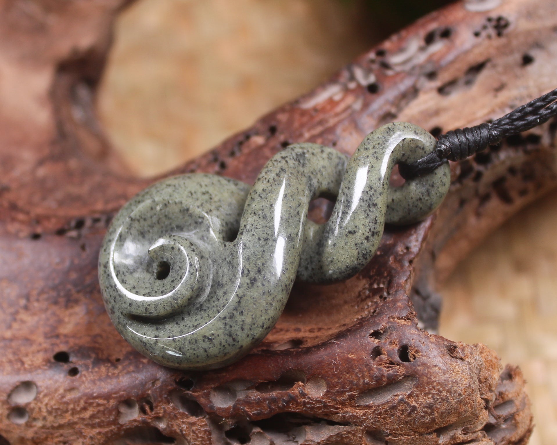Koru Twist carved from Serpentine Pounamu - NZ Greenstone