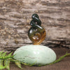 Flower Jade Pounamu Koru Twist set on a Pounamu base - NZ Greenstone