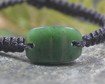 Adjustable cord bracelet with Hapopo Pounamu