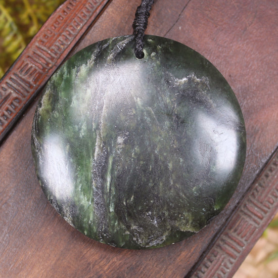 Porowhita carved from Rimu Pounamu - NZ Greenstone
