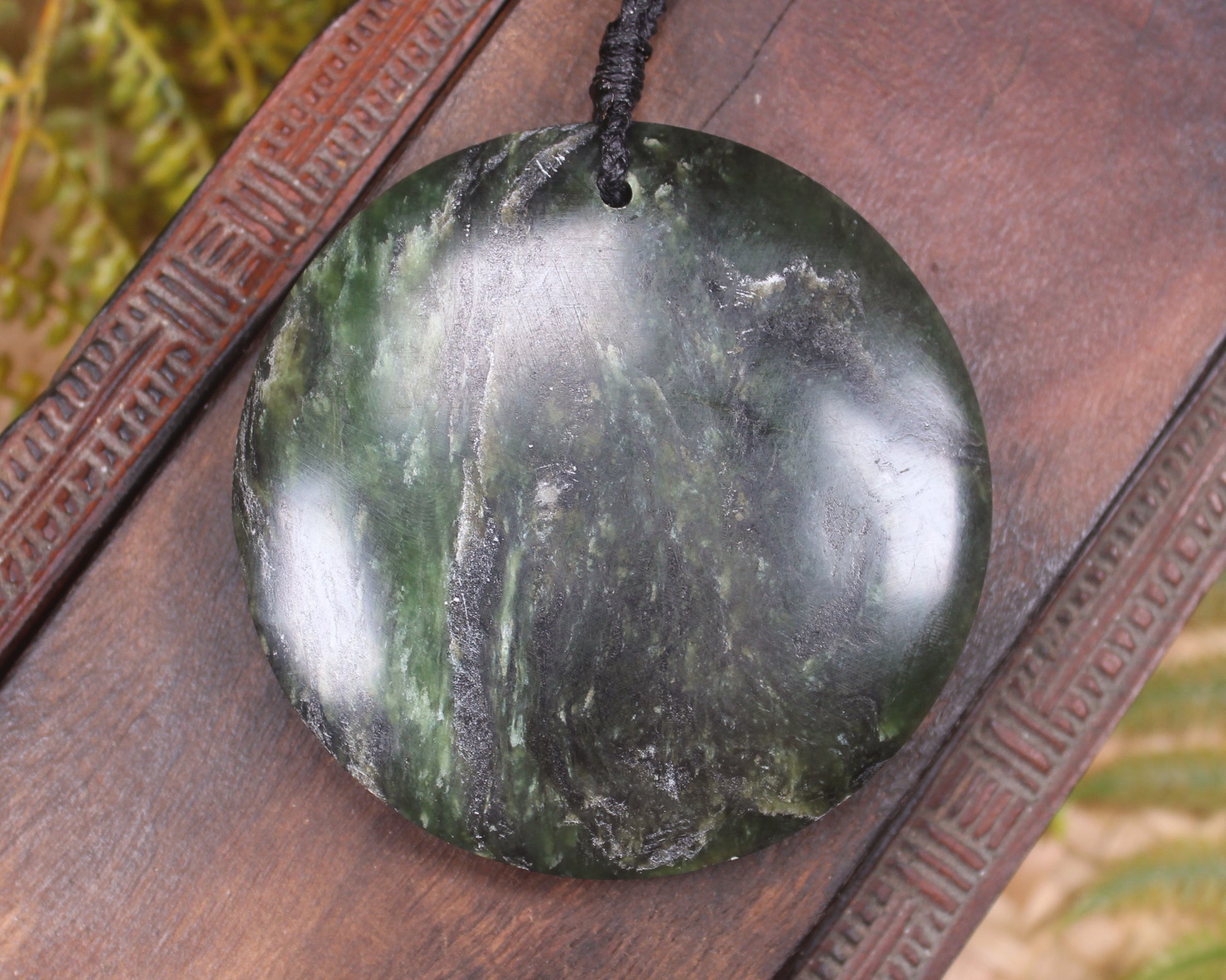 Porowhita carved from Rimu Pounamu - NZ Greenstone