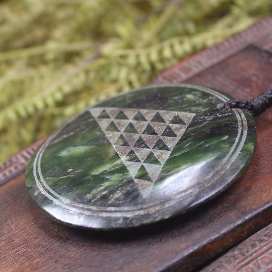 Porowhita carved from Rimu Pounamu - NZ Greenstone