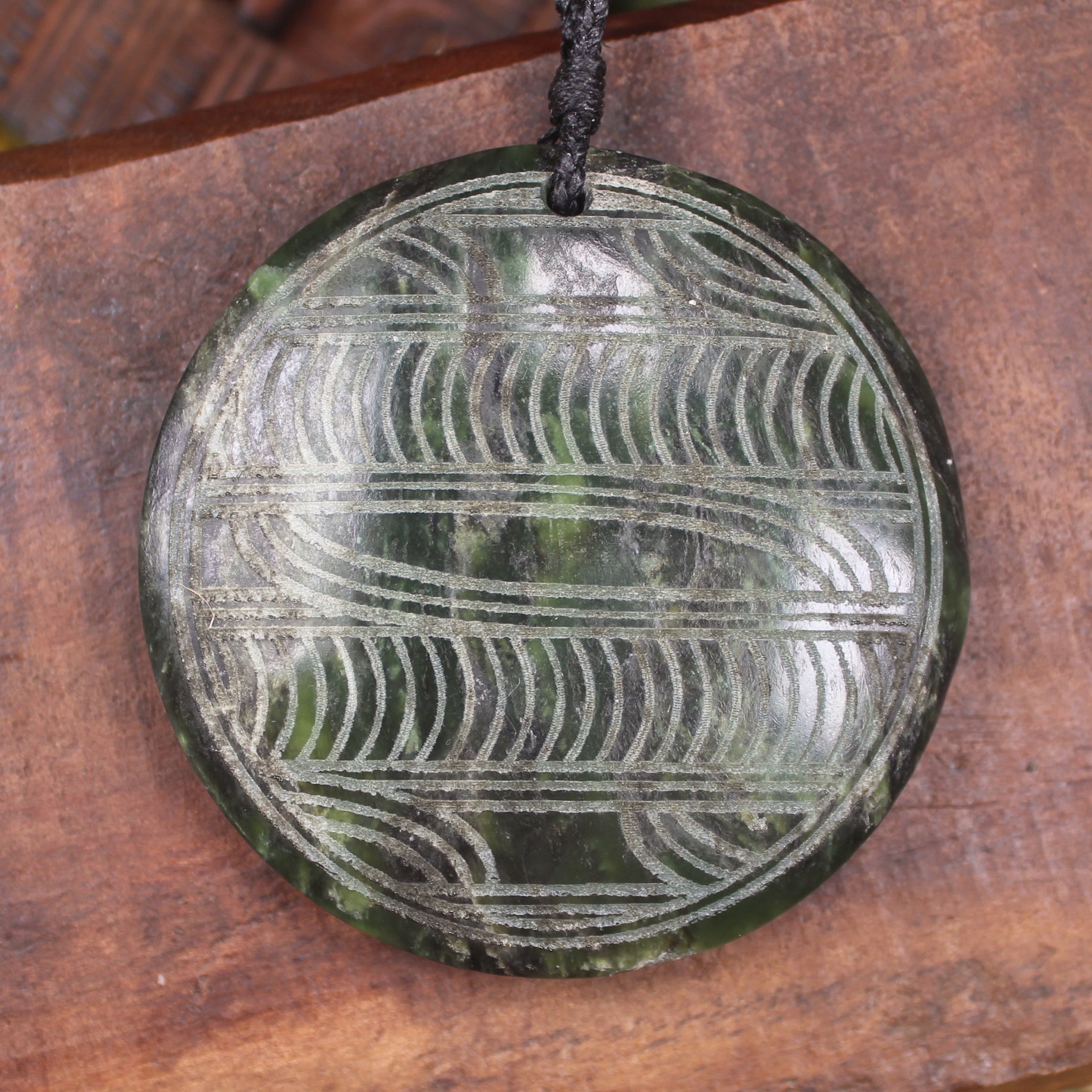 Porowhita carved from Rimu Pounamu - NZ Greenstone