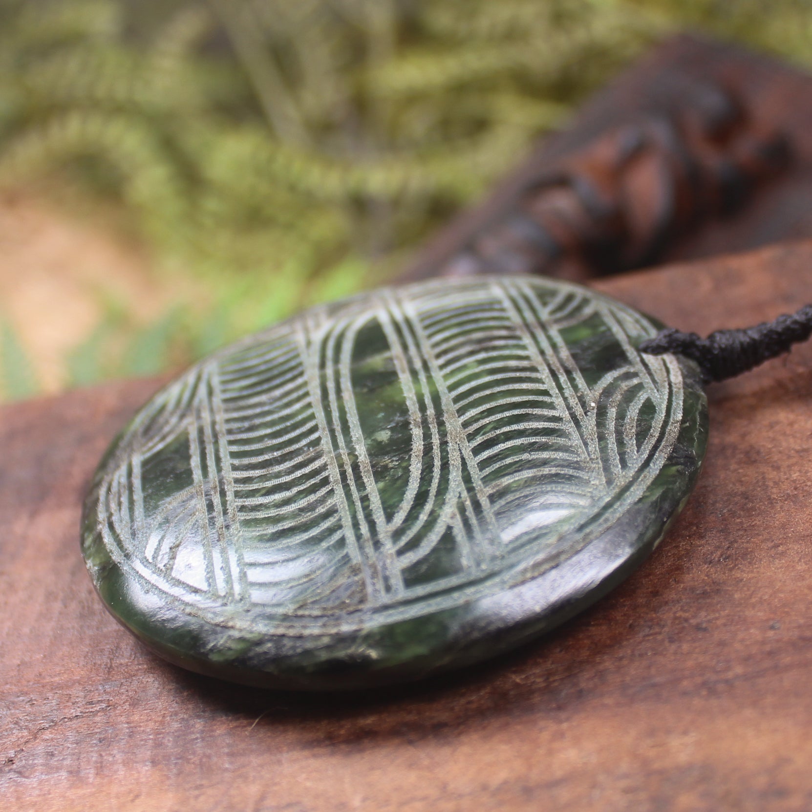 Porowhita carved from Rimu Pounamu - NZ Greenstone