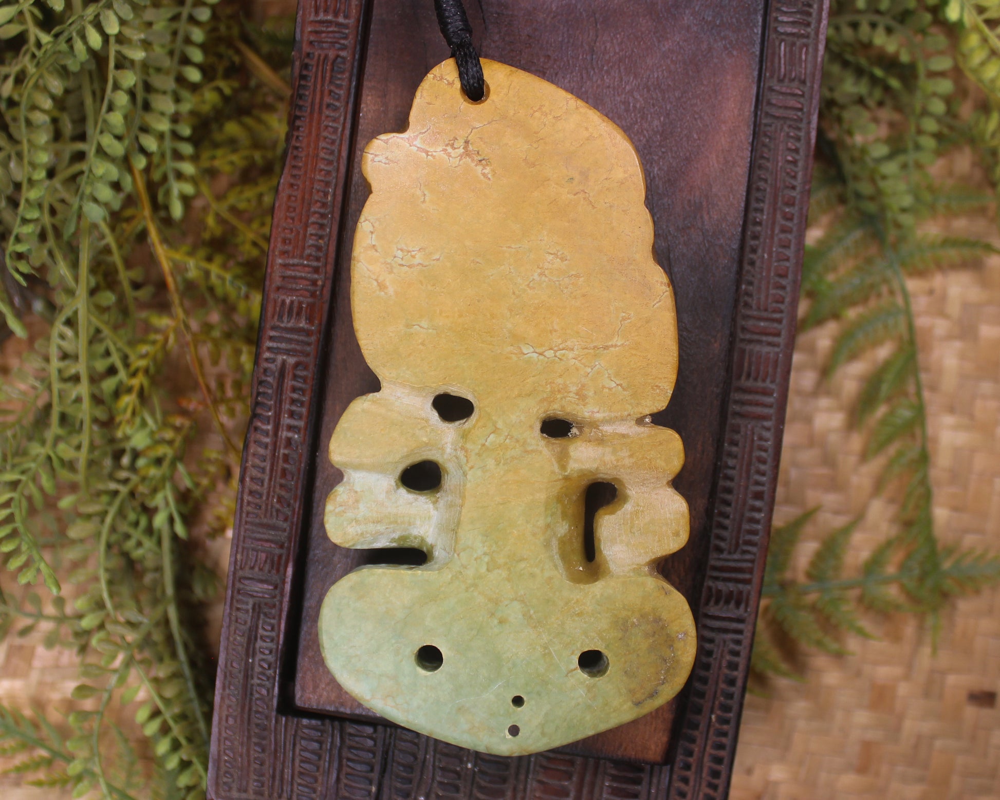 Hei Tiki carved from Flower Jade Pounamu - NZ Greenstone