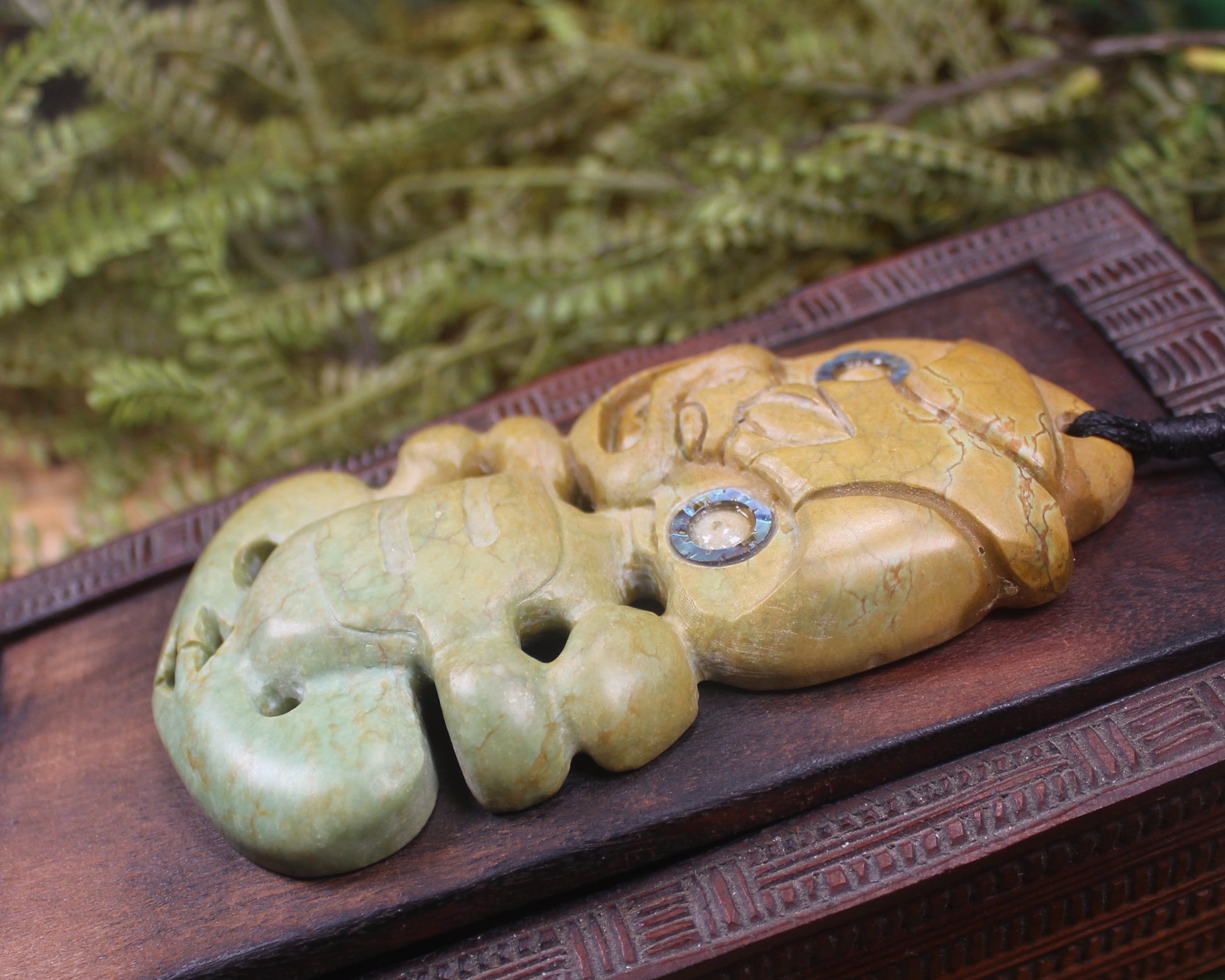 Hei Tiki carved from Flower Jade Pounamu - NZ Greenstone