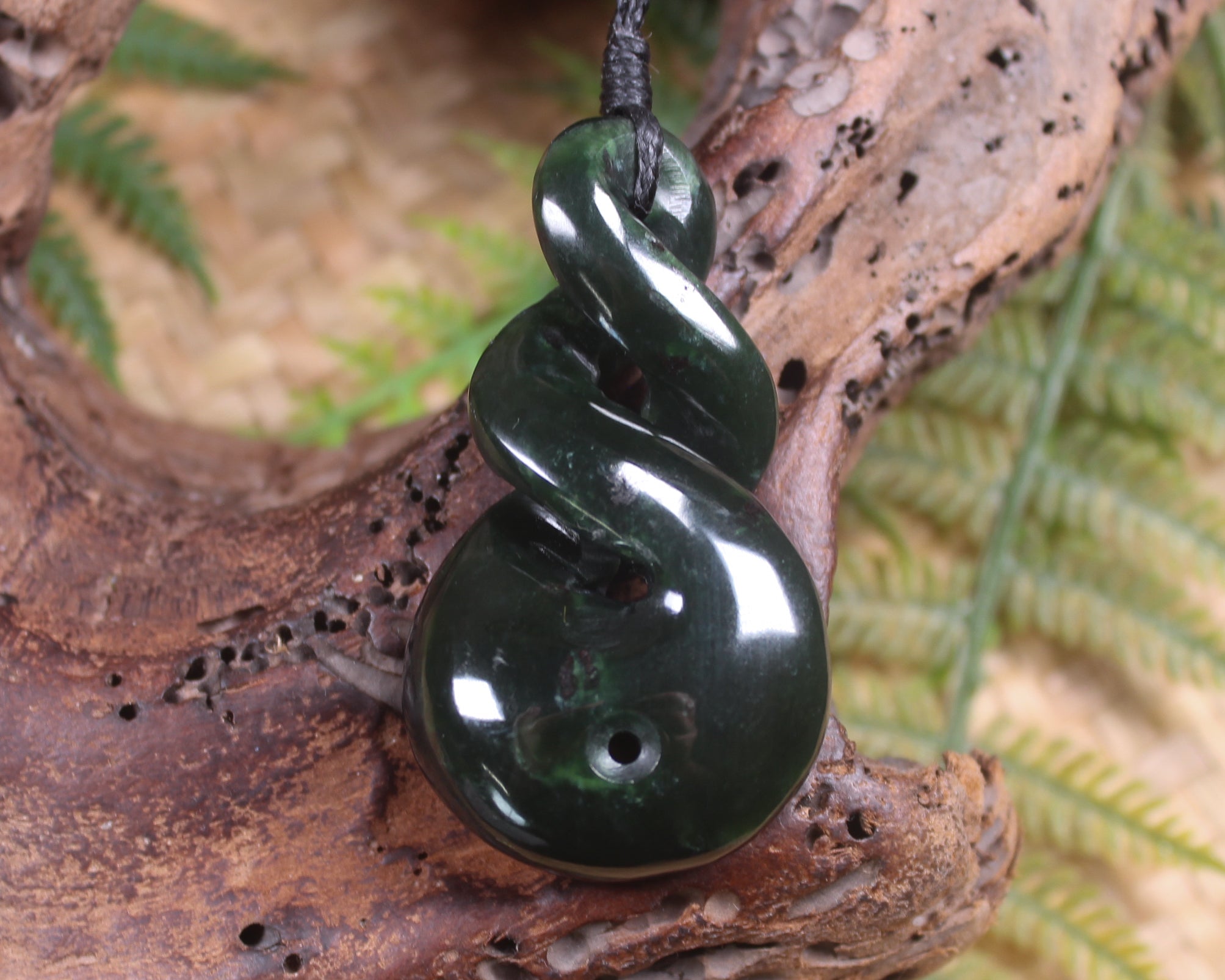 Koru Twist carved from Kawakawa Pounamu - NZ Greenstone