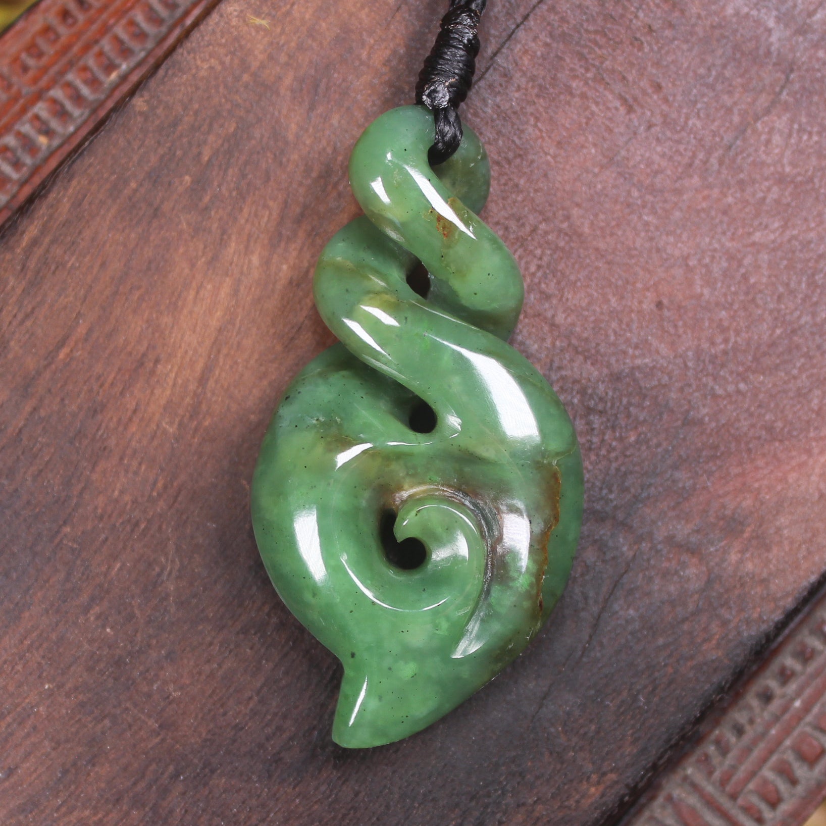 Hapopo Pounamu Koru Twist pendant  - NZ Greenstone