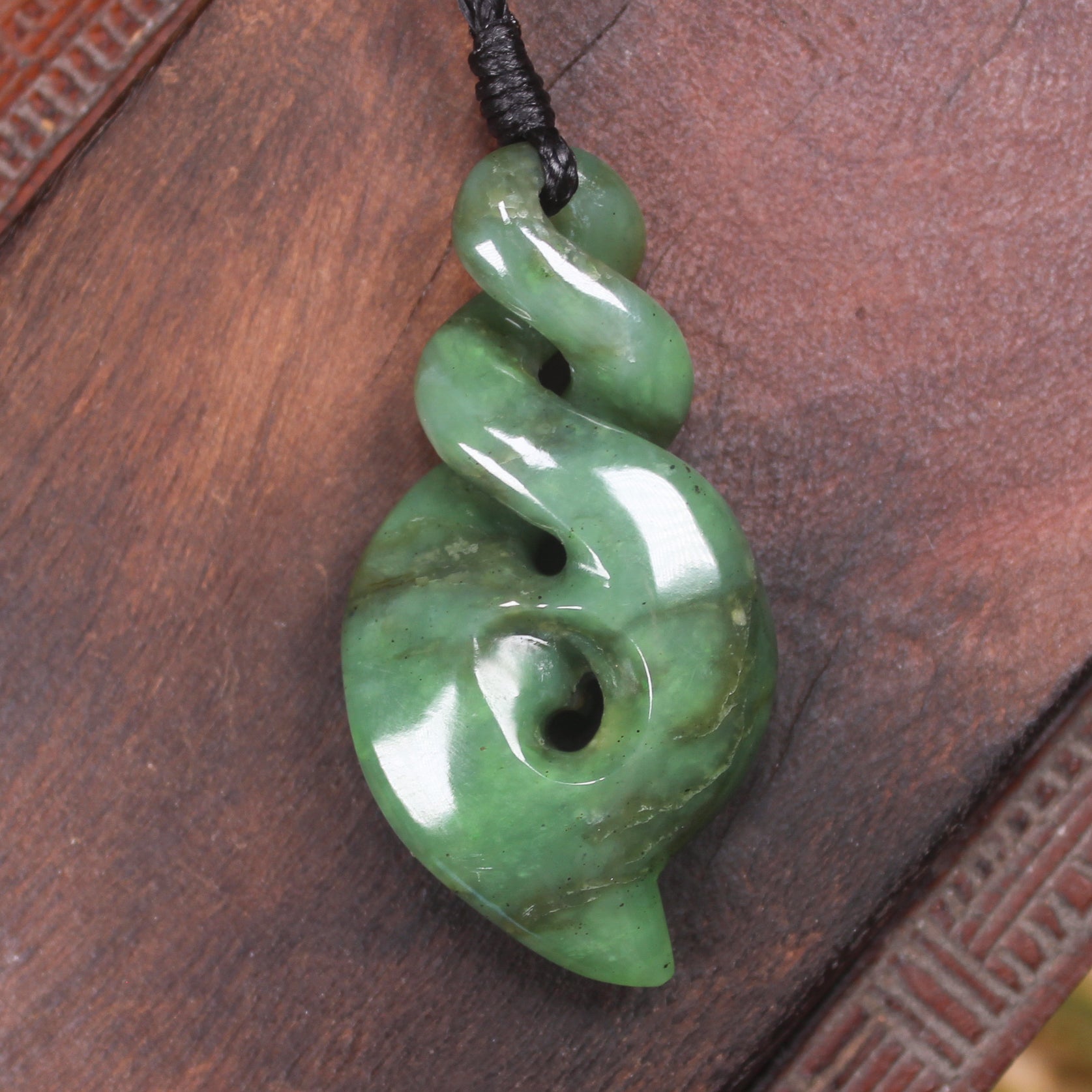 Hapopo Pounamu Koru Twist pendant  - NZ Greenstone