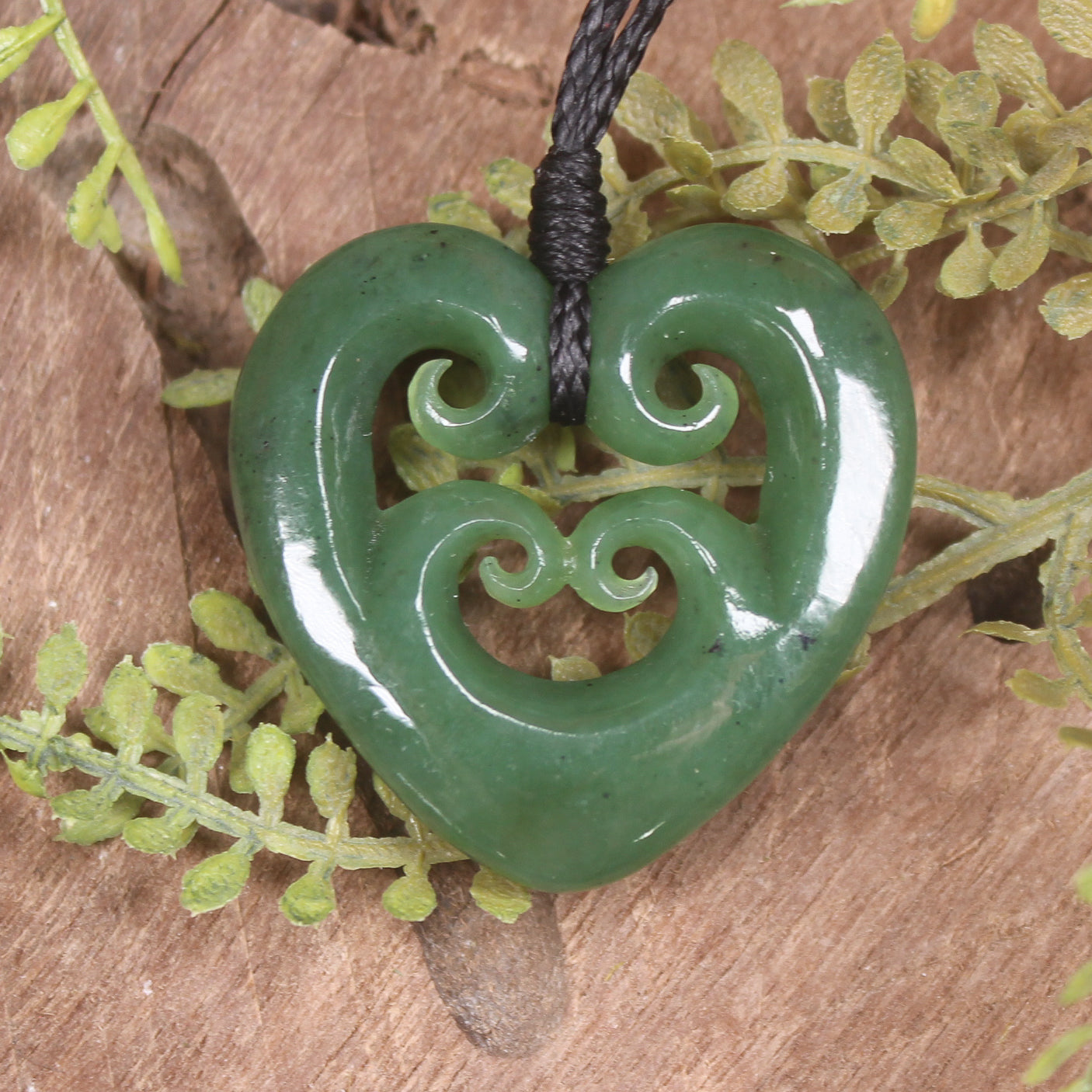 Heart with Koru carved from Hapopo Pounamu - NZ Greenstone