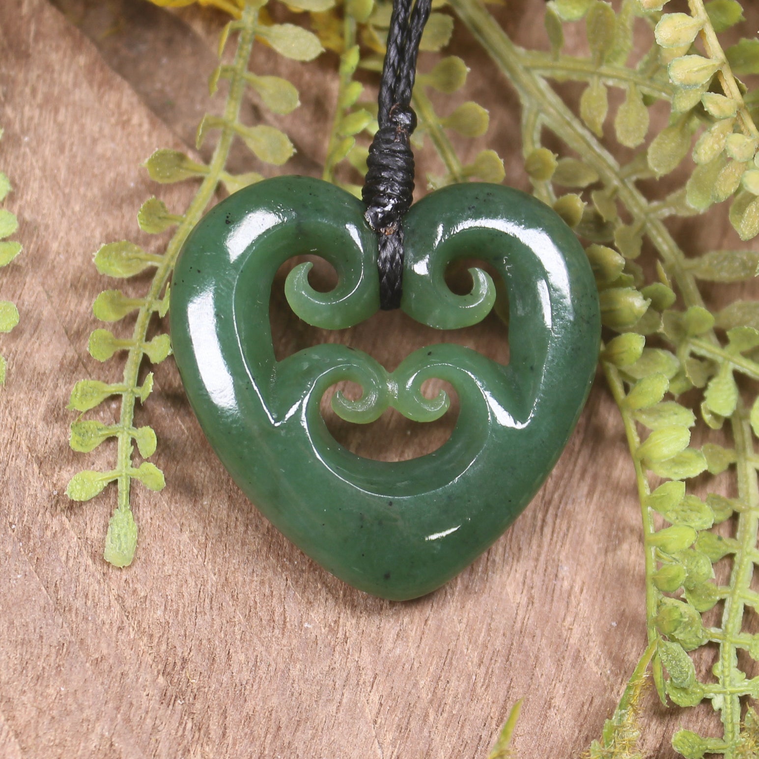 Heart with Koru carved from Hapopo Pounamu - NZ Greenstone
