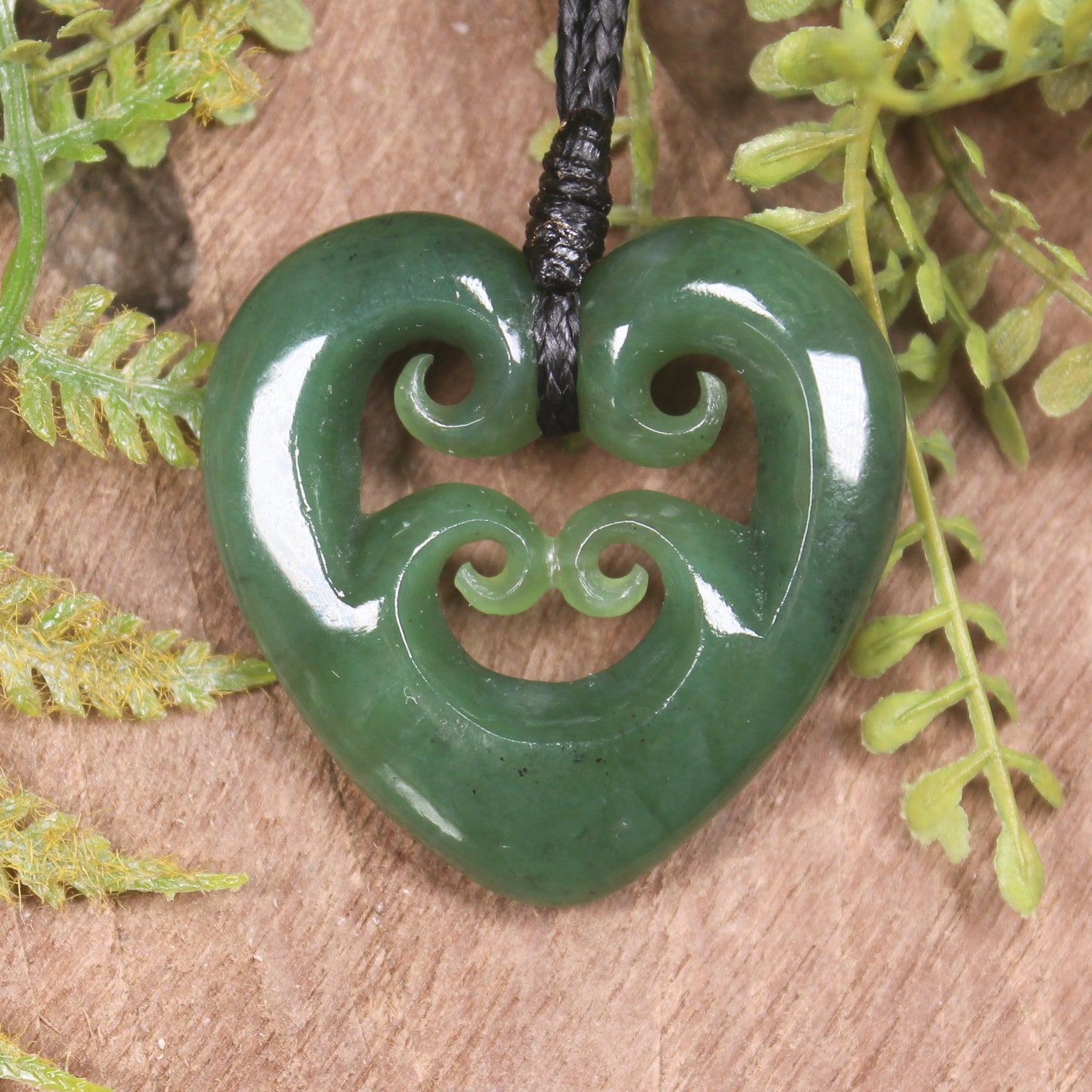 Heart with Koru carved from Hapopo Pounamu - NZ Greenstone