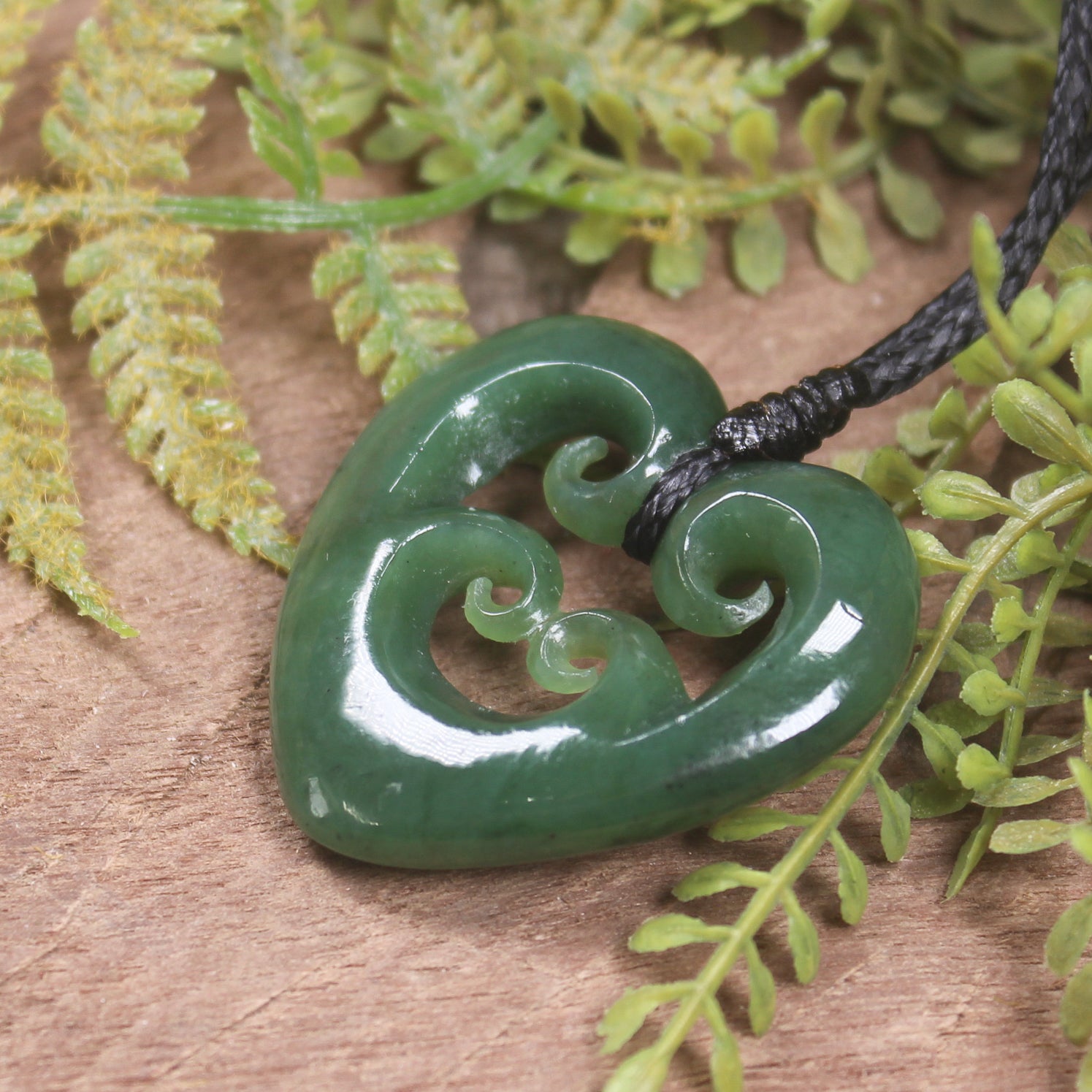 Heart with Koru carved from Hapopo Pounamu - NZ Greenstone