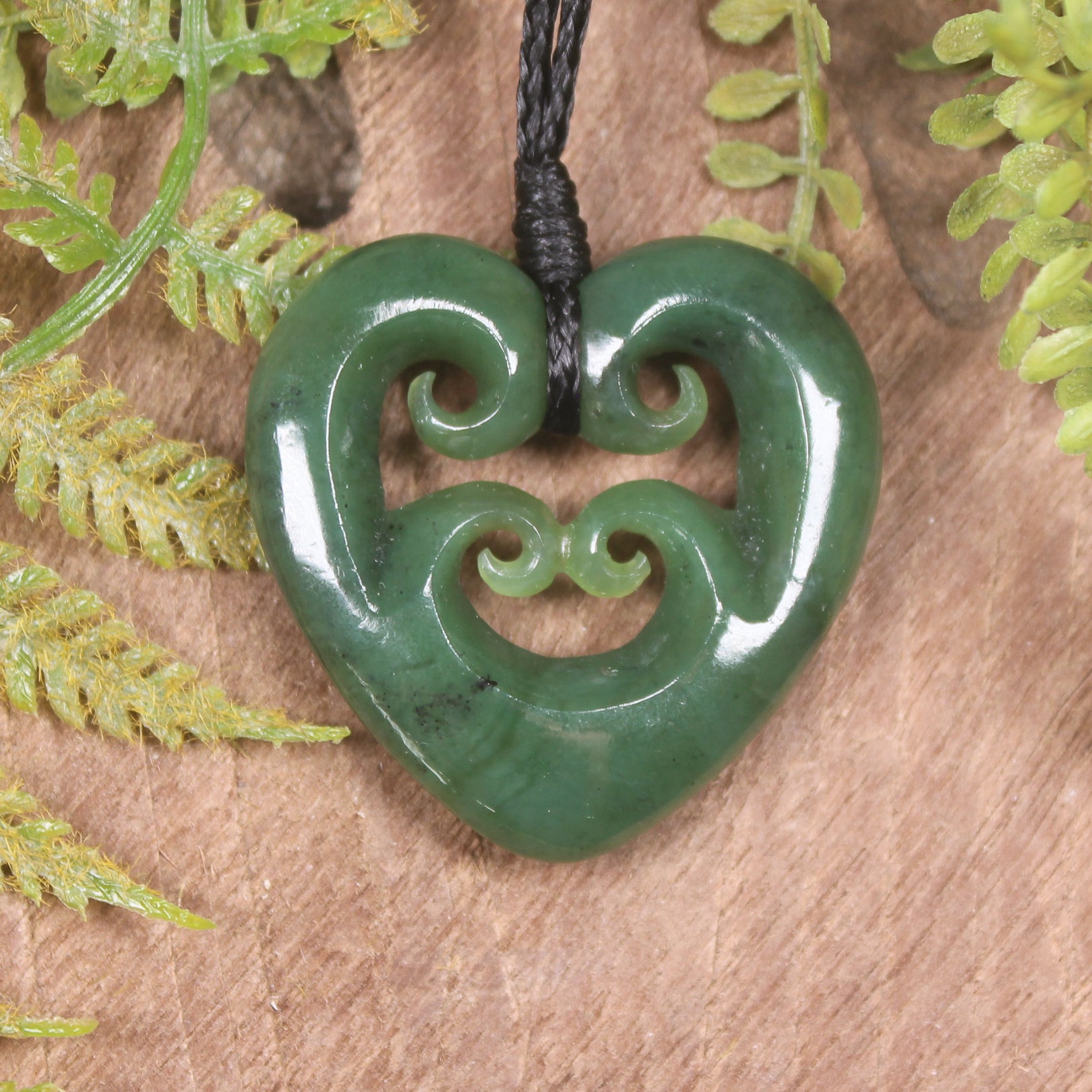 Heart with Koru carved from Hapopo Pounamu - NZ Greenstone