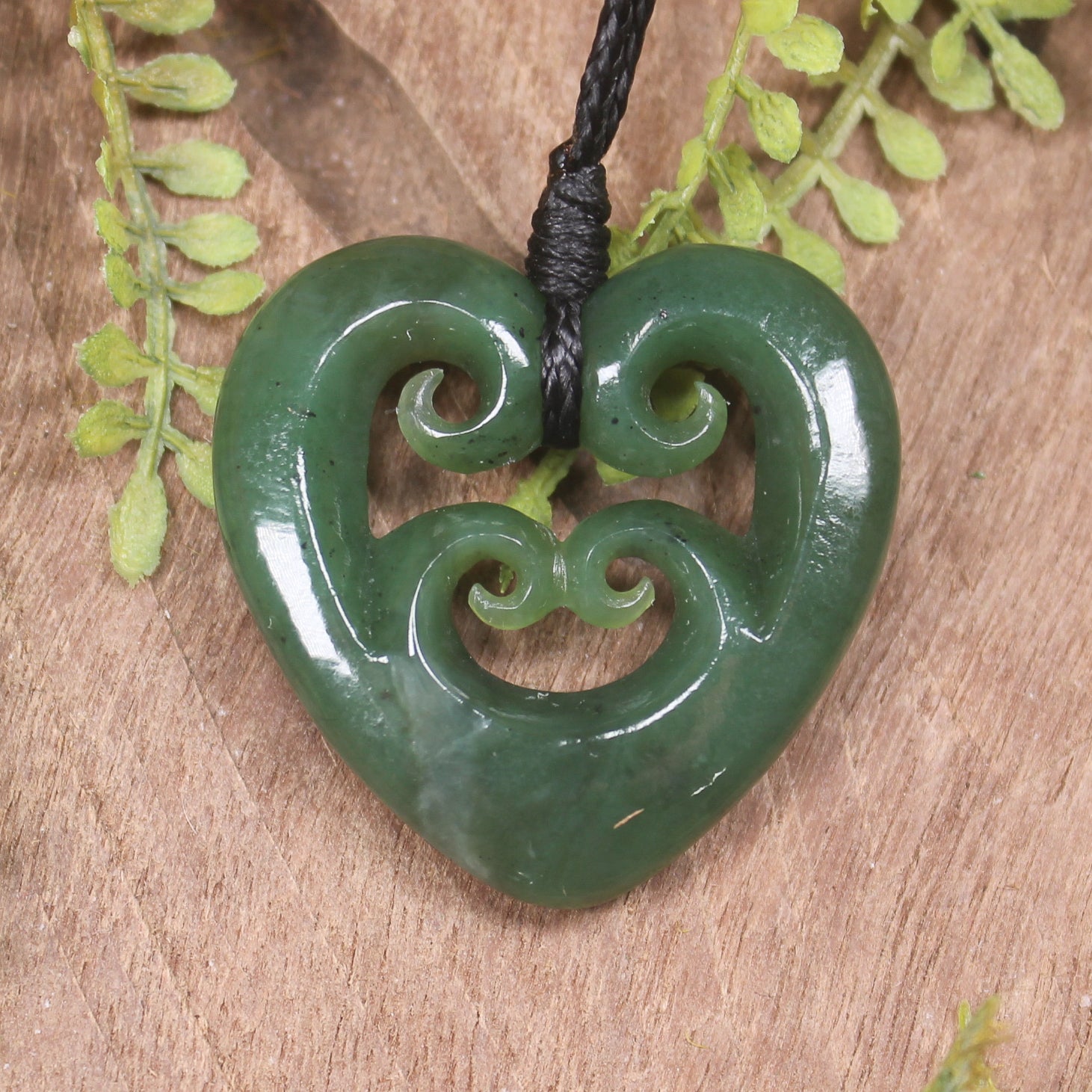 Heart with Koru carved from Hapopo Pounamu - NZ Greenstone