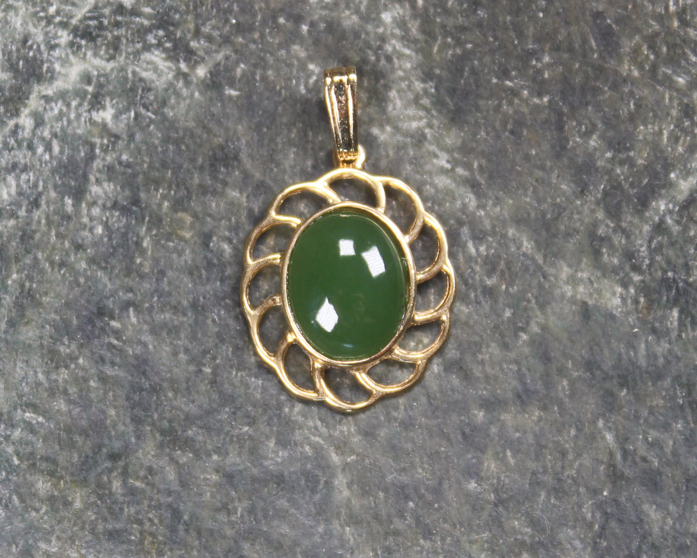 Kawakawa Pounamu pendant with a gold plated setting - NZ Greenstone