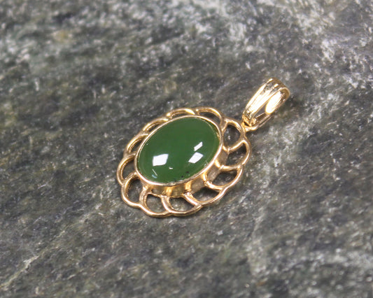 Kawakawa Pounamu pendant with a gold plated setting - NZ Greenstone