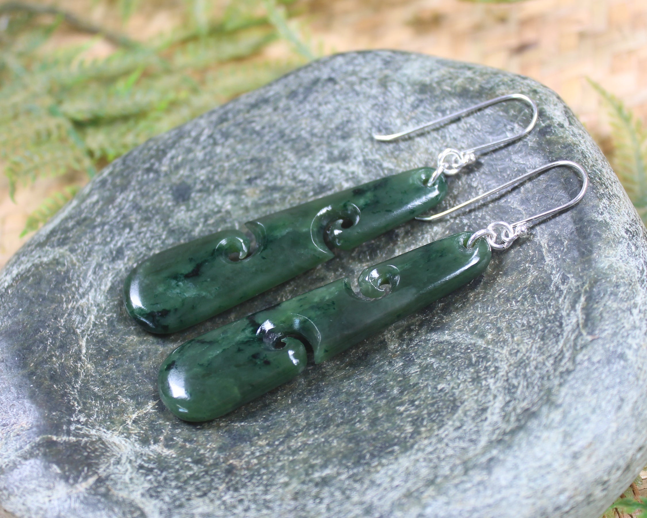 Roimata with Koru earrings carved from Kawakawa Pounamu - NZ Greenstone