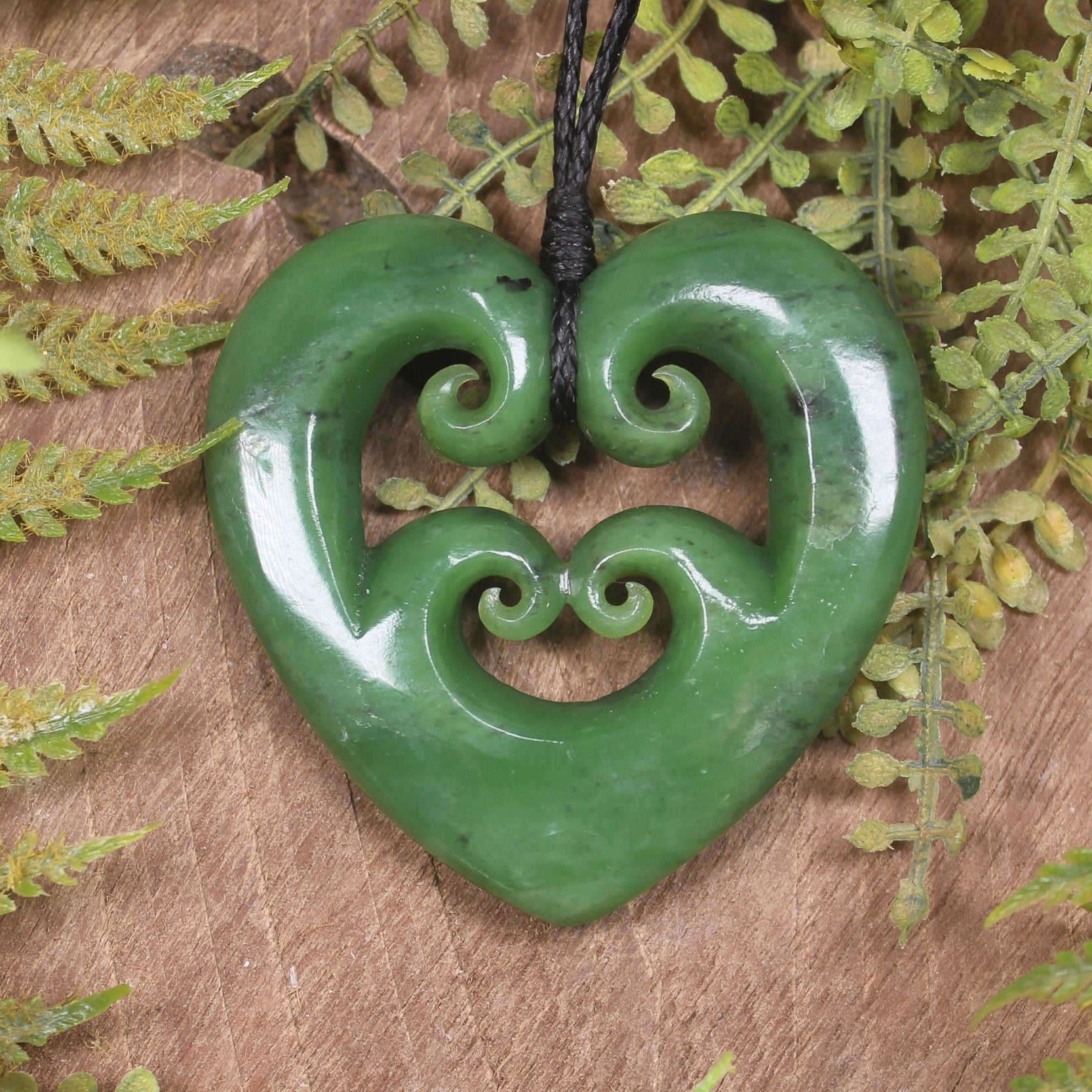 Heart with Koru carved from Hapopo Pounamu - NZ Greenstone