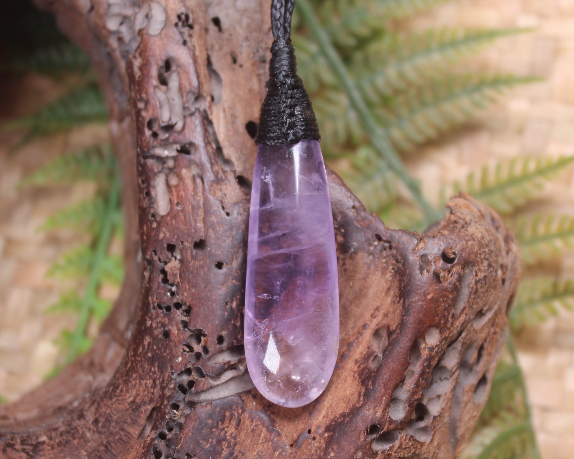 Roimata pendant carved from Amethyst