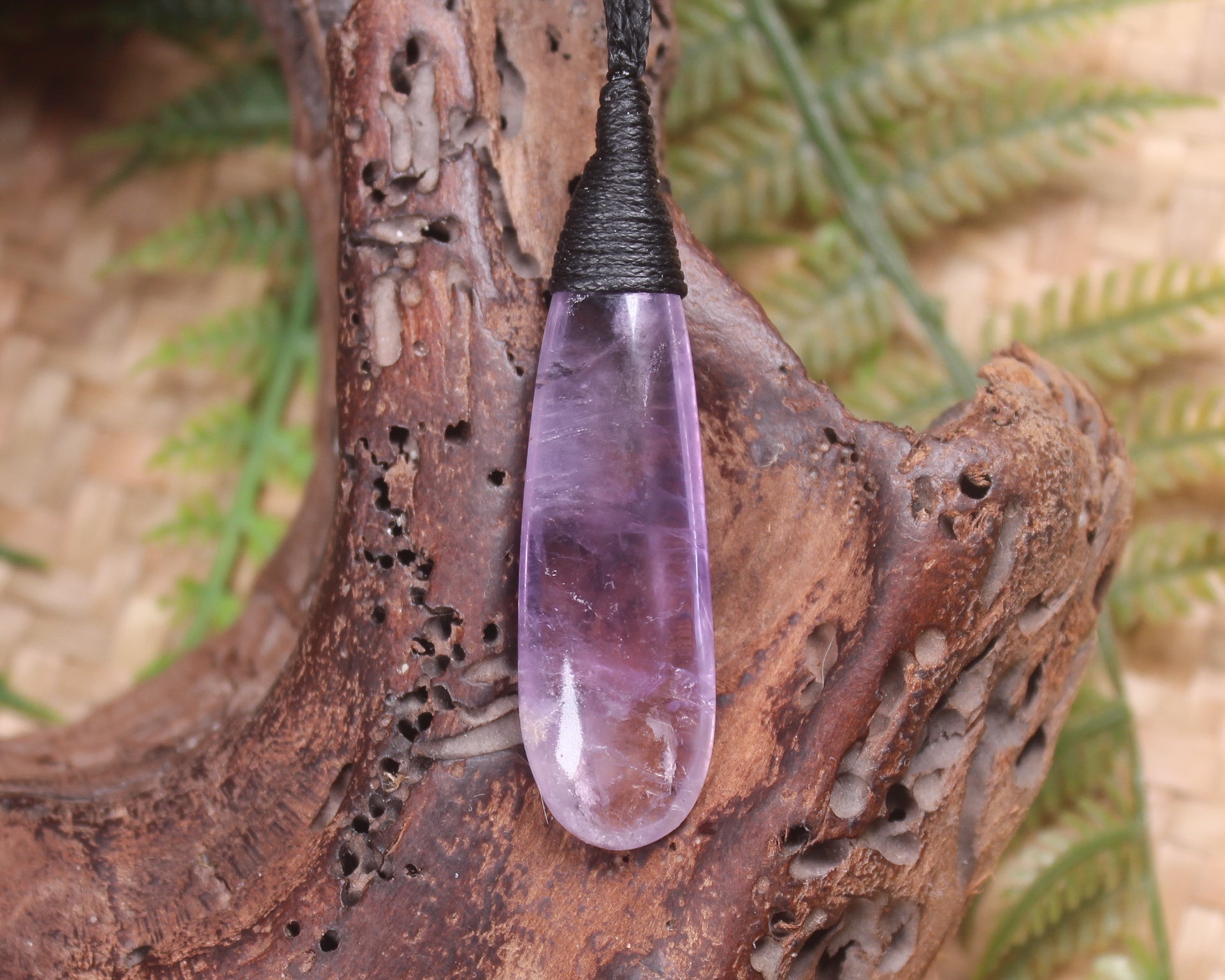 Roimata pendant carved from Amethyst