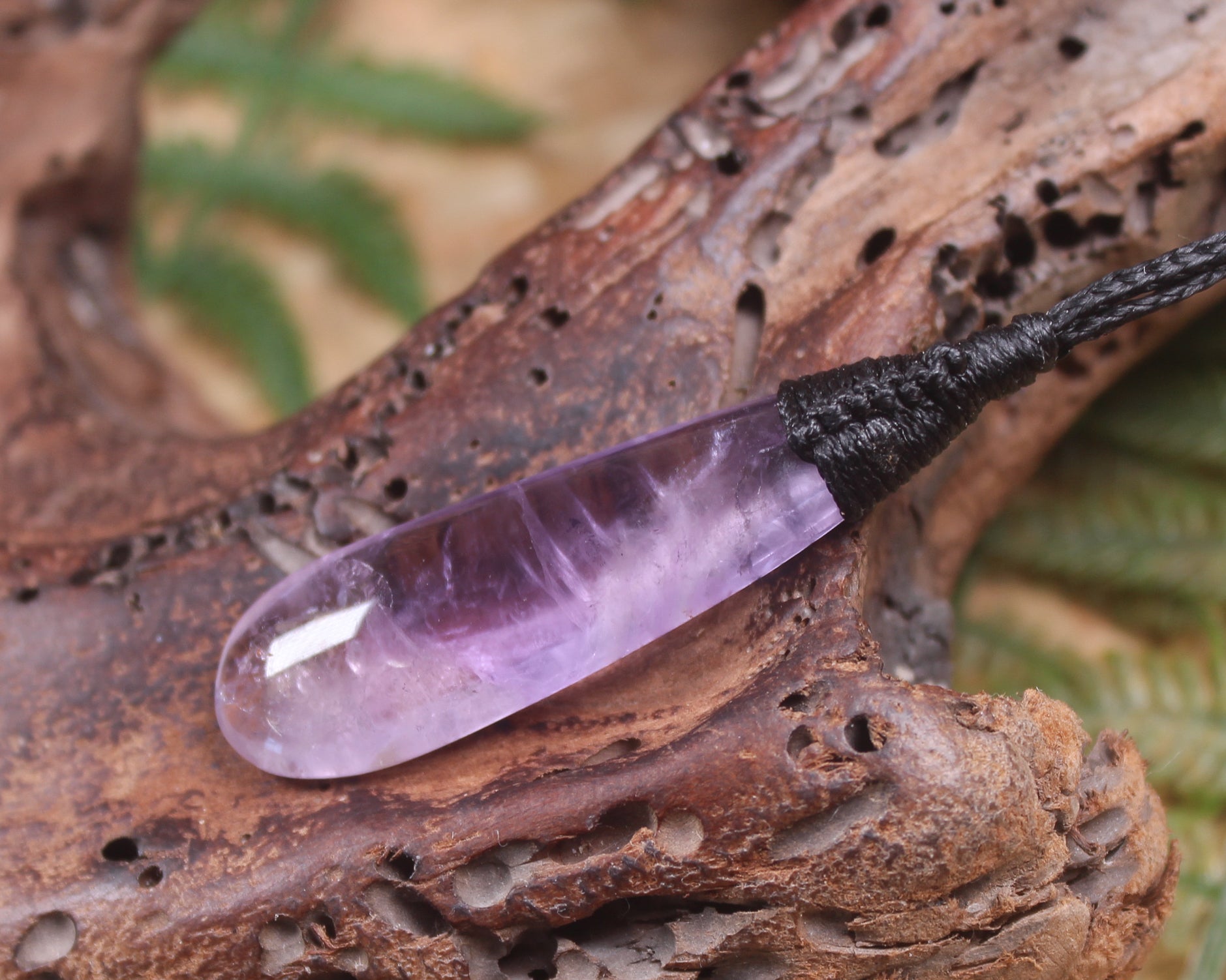 Roimata pendant carved from Amethyst