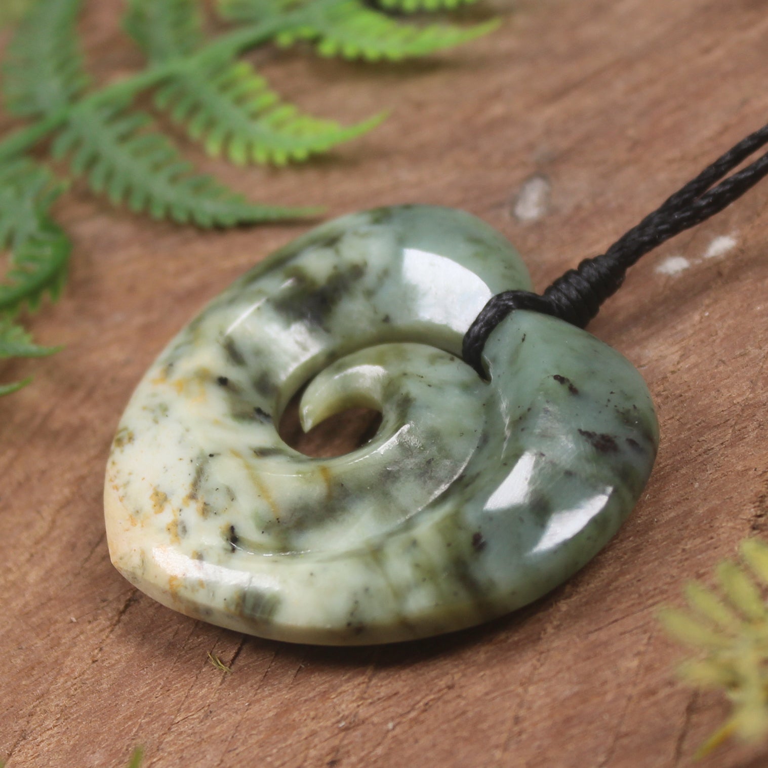 Heart with Koru carved from Flower Jade Pounamu - NZ Greenstone
