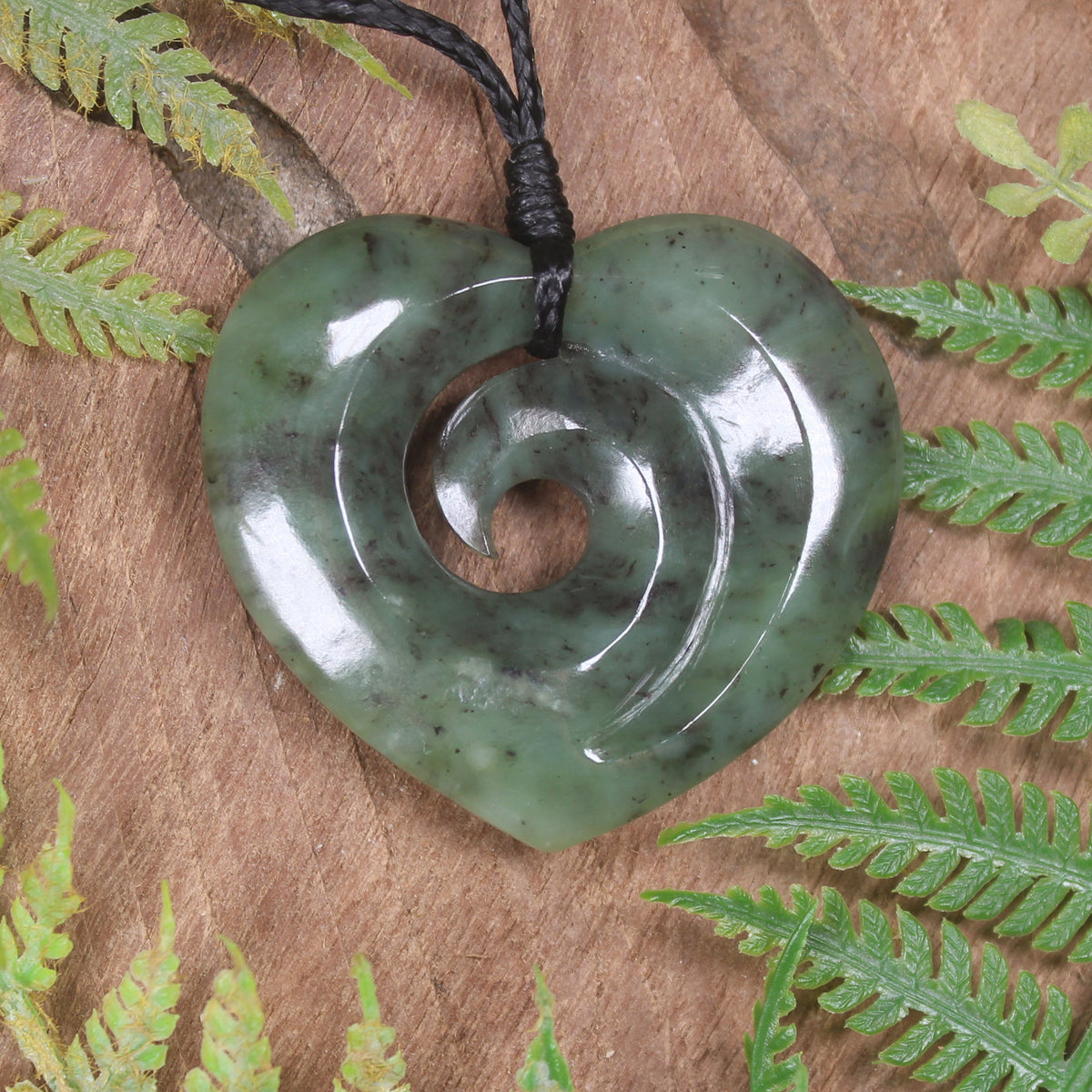 Heart with Koru carved from Hapopo Pounamu - NZ Greenstone