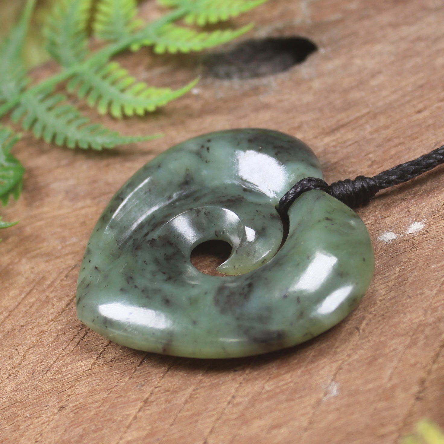 Koru Heart pendant carved from Hapopo Pounamu - NZ Greenstone