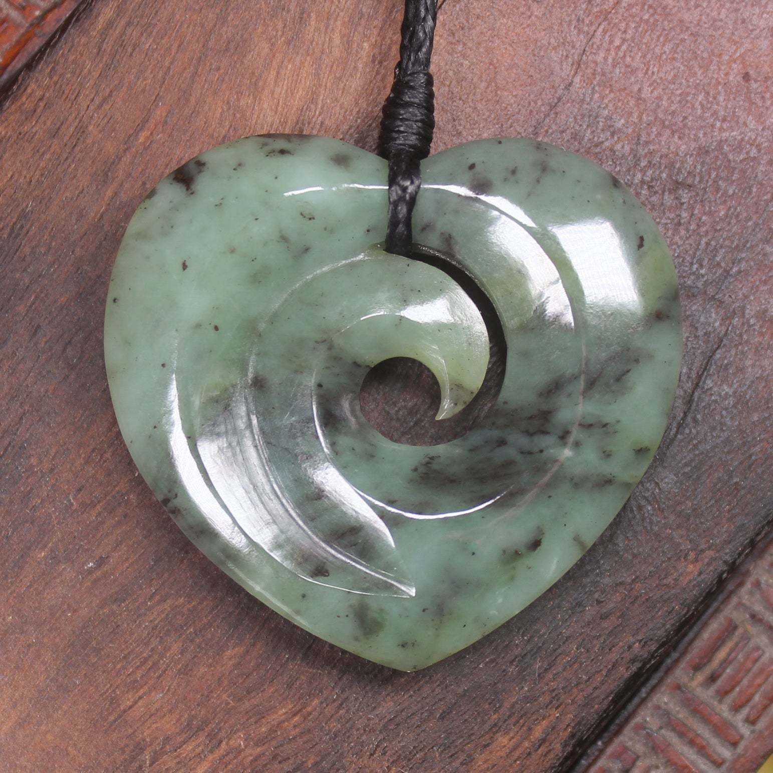 Koru Heart pendant carved from Hapopo Pounamu - NZ Greenstone