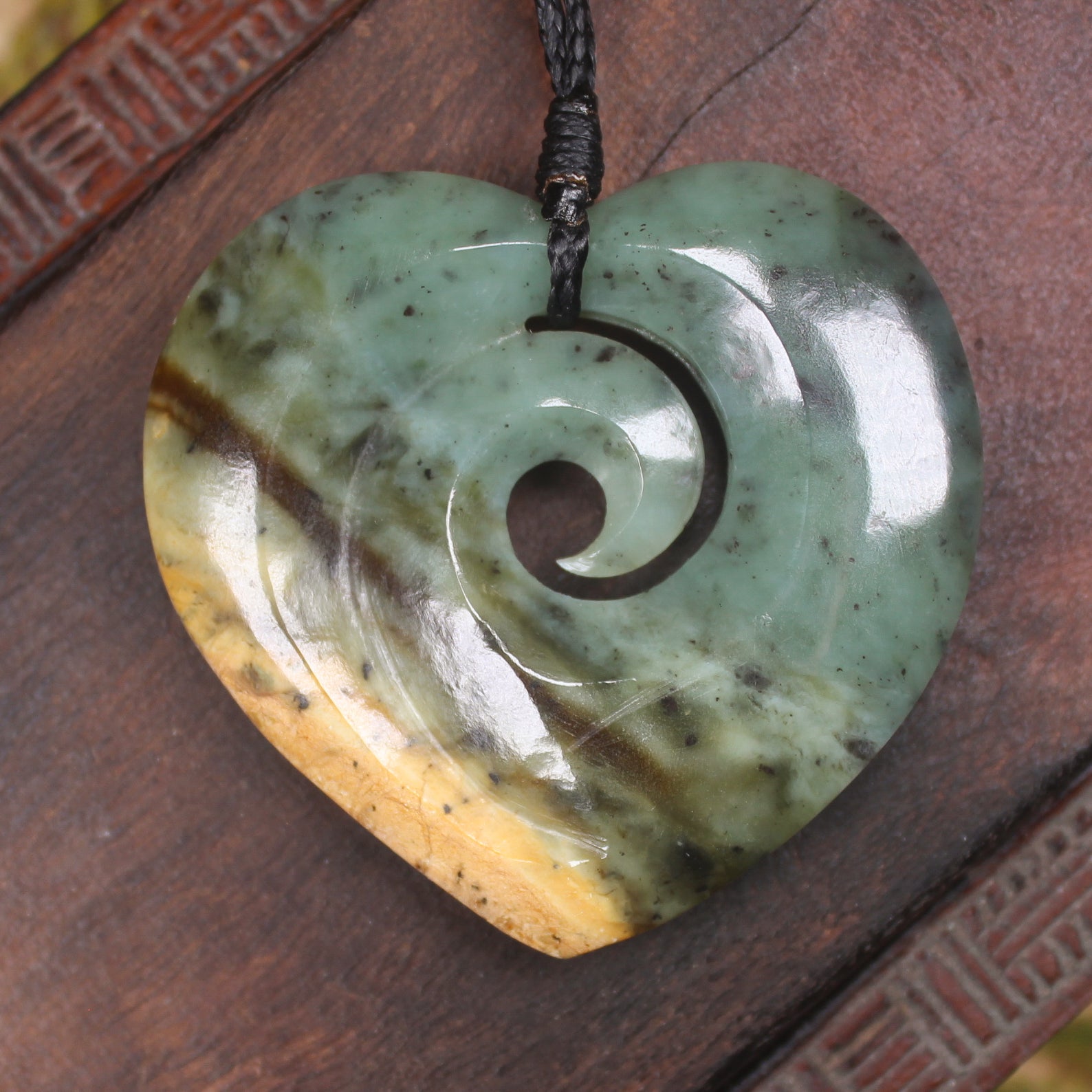 Heart with Koru carved from Flower Jade Pounamu - NZ Greenstone