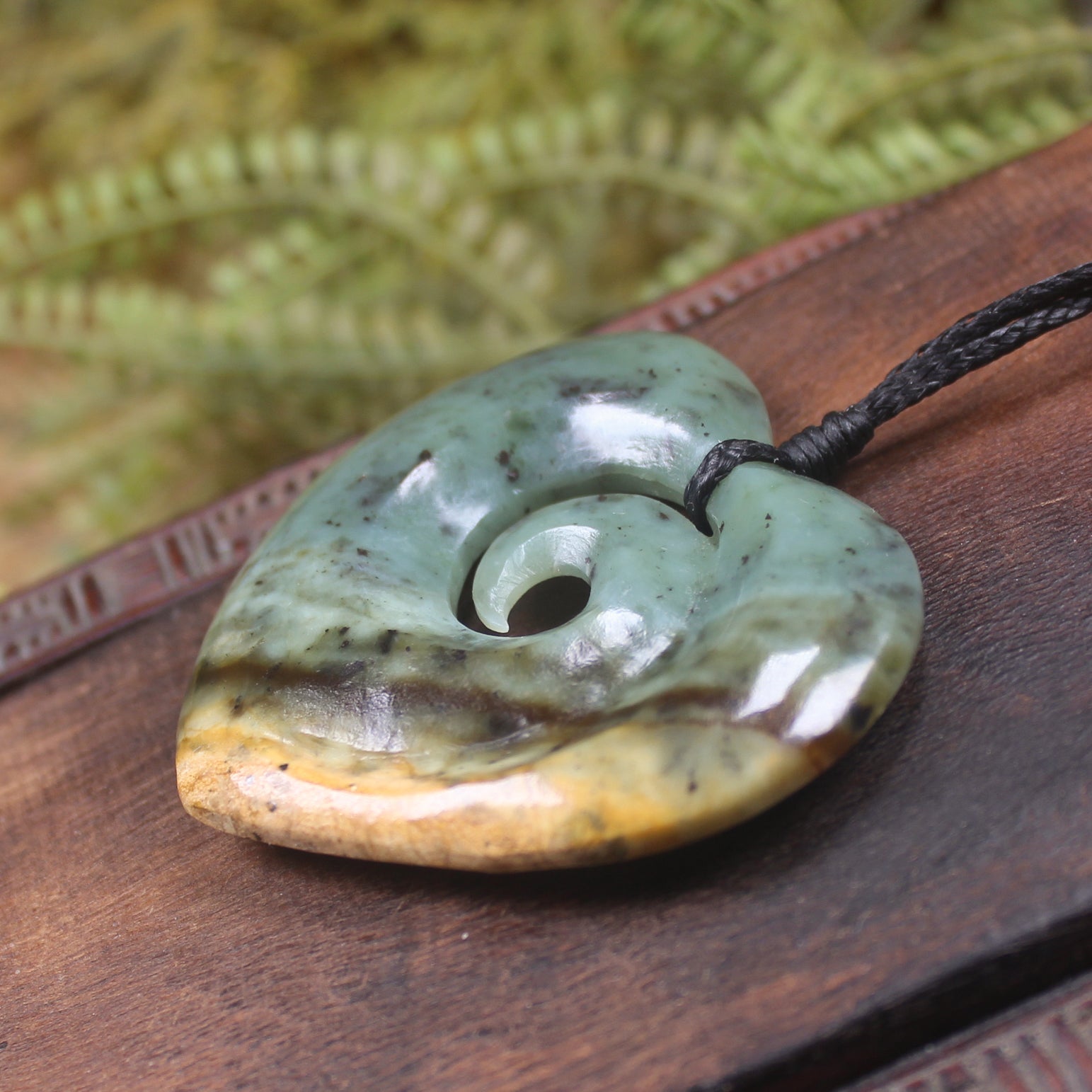 Heart with Koru carved from Flower Jade Pounamu - NZ Greenstone