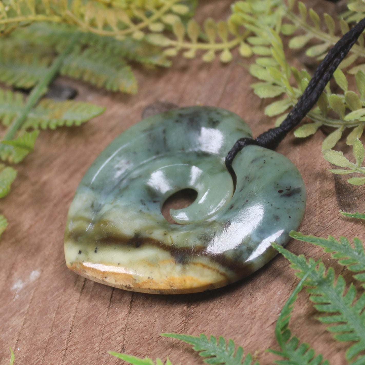 Heart with Koru carved from Flower Jade Pounamu - NZ Greenstone