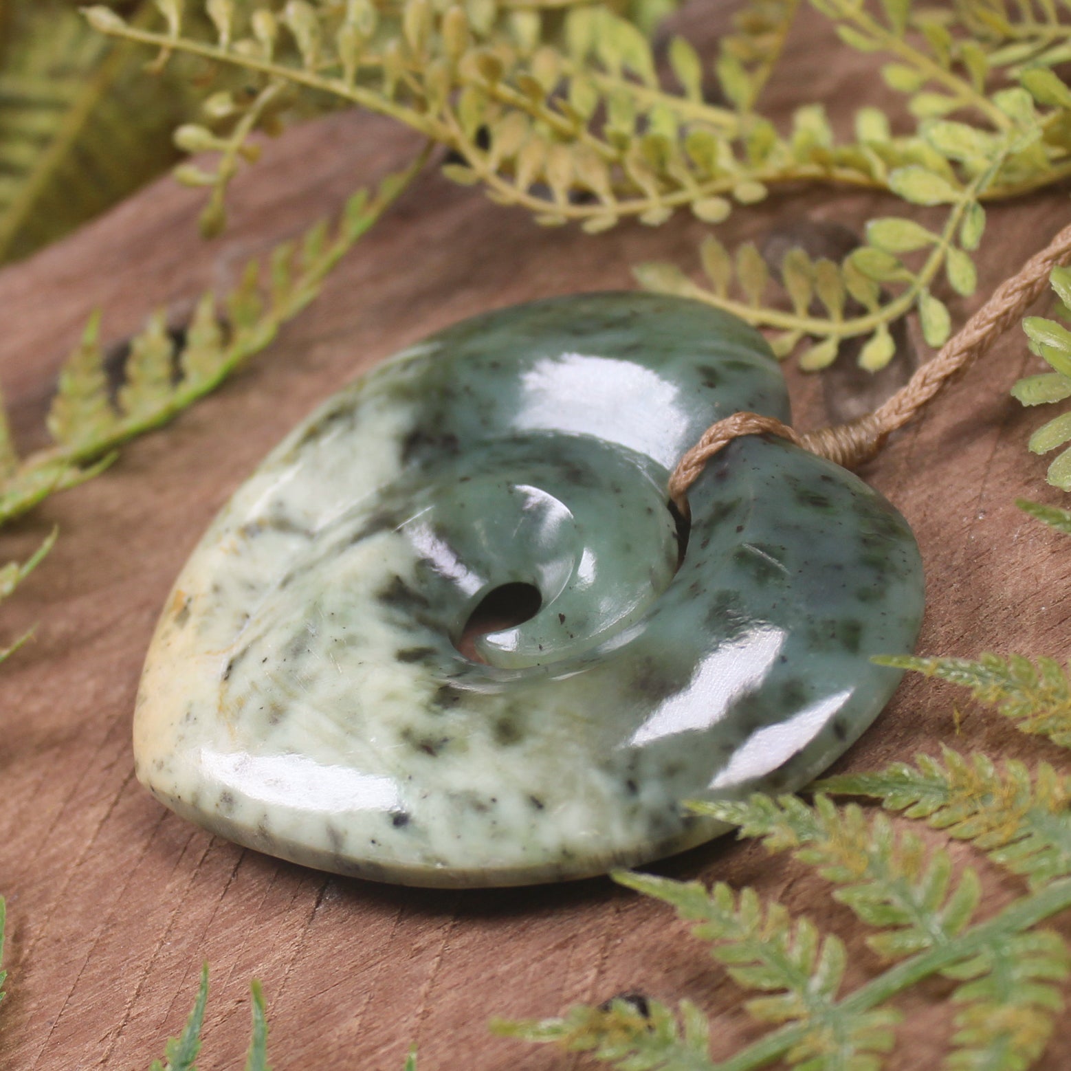 Heart with Koru carved from Flower Jade Pounamu - NZ Greenstone