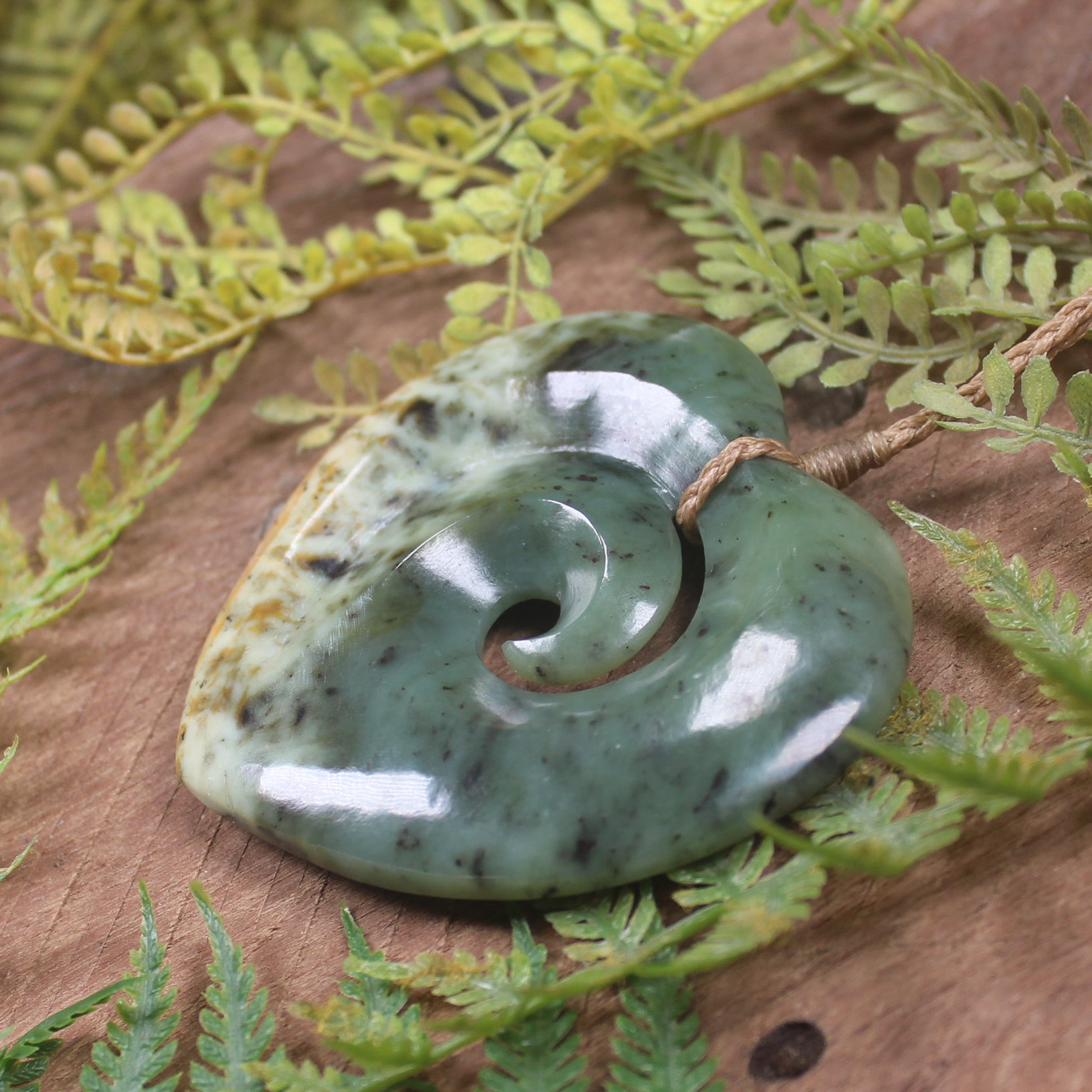 Heart with Koru carved from Flower Jade Pounamu - NZ Greenstone