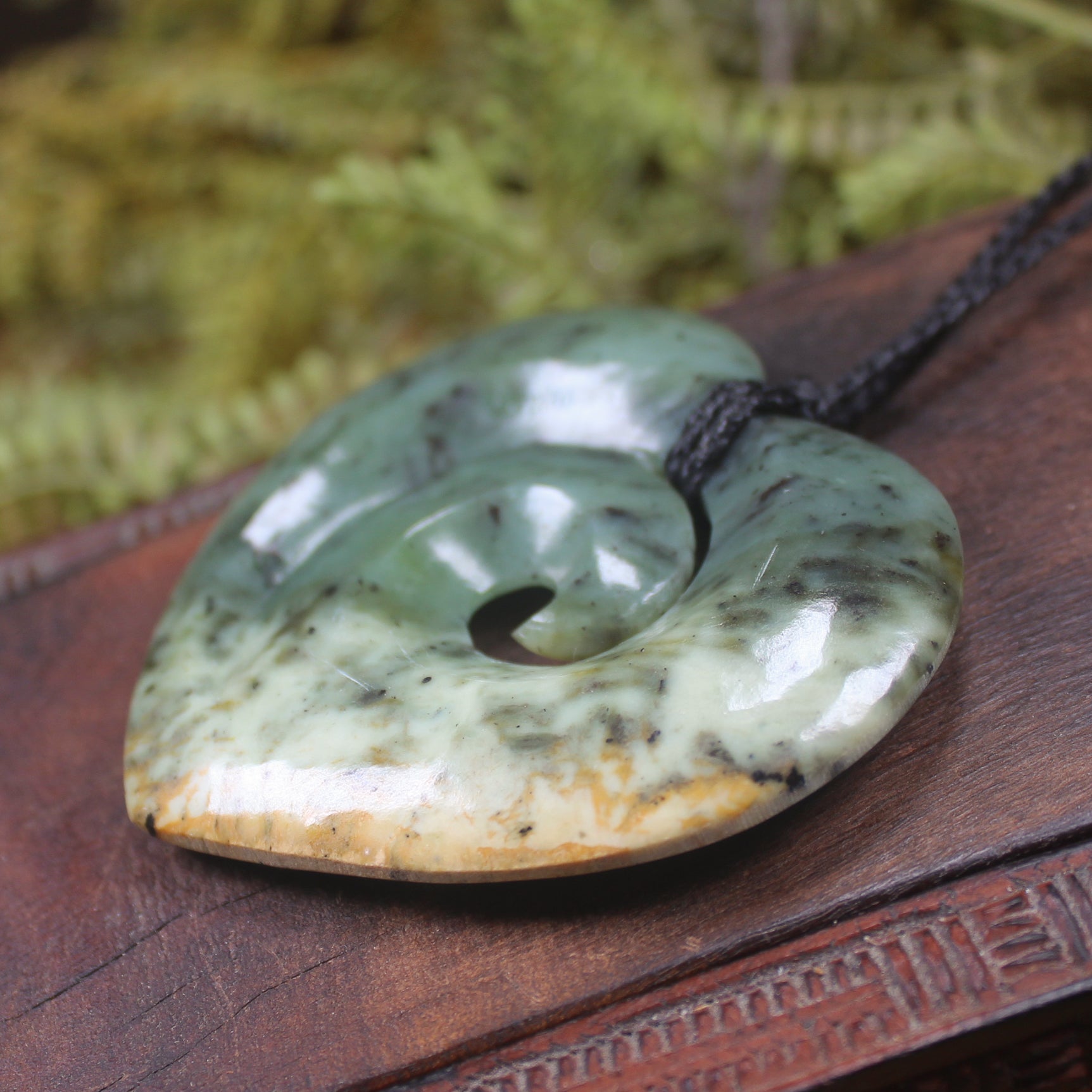 Heart with Koru carved from Flower Jade Pounamu - NZ Greenstone