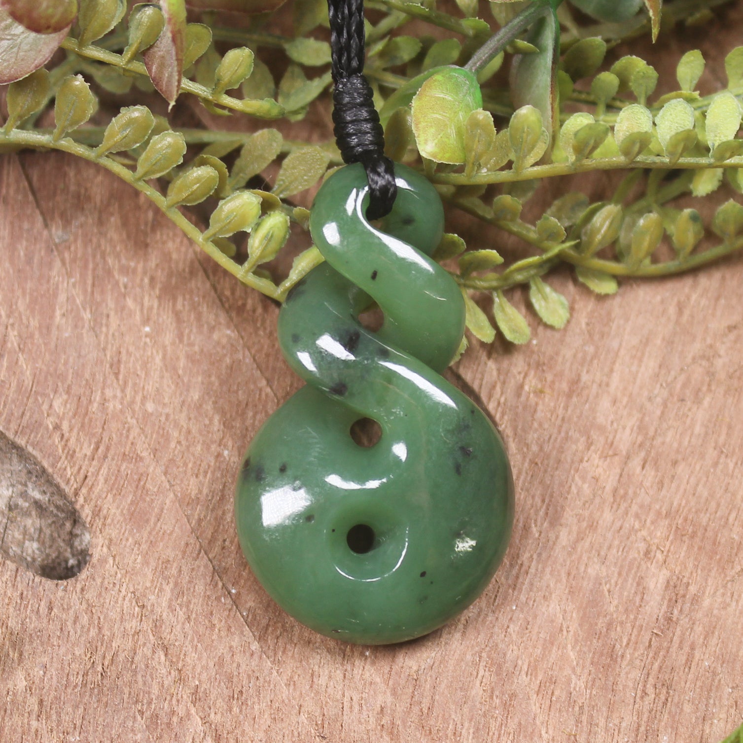 Twist or Pikorua carved from Hapopo Pounamu - NZ Greenstone