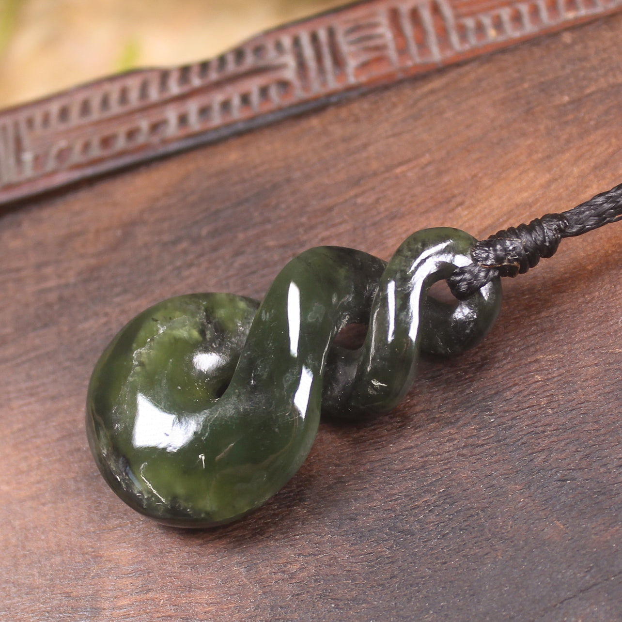 Twist carved from Rimu Pounamu - NZ Greenstone