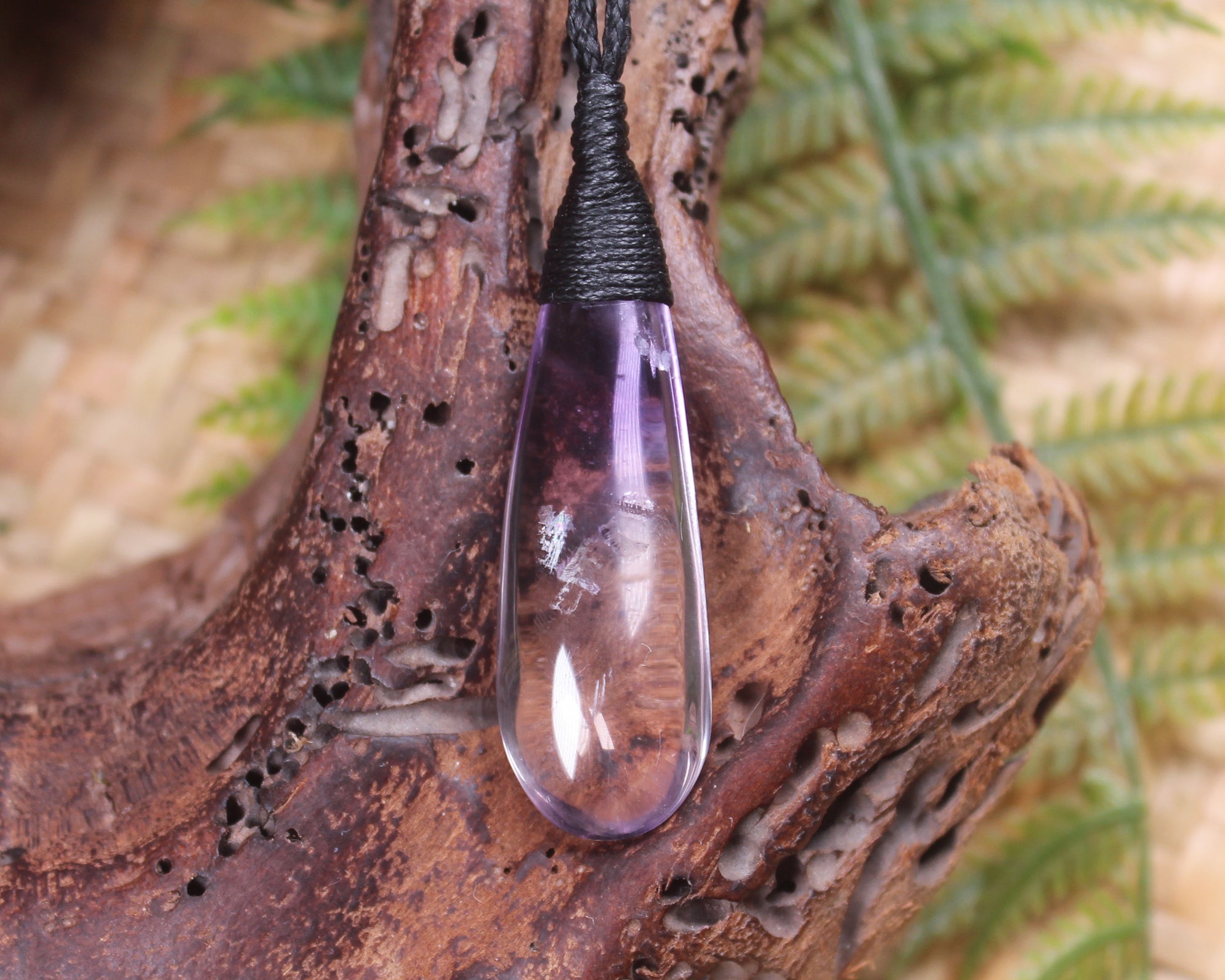 Roimata pendant carved from Amethyst