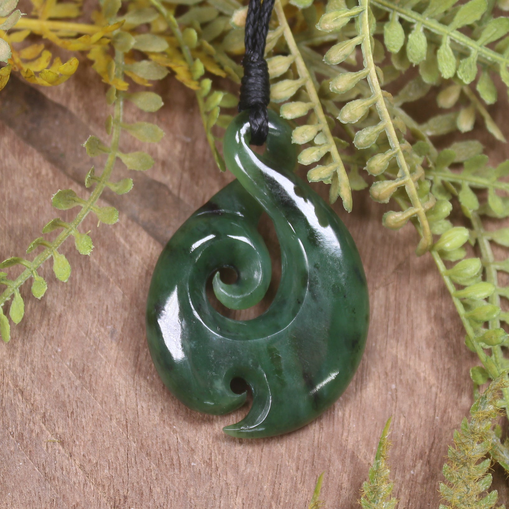 Koru Twist carved from Kawakawa Pounamu - NZ Greenstone