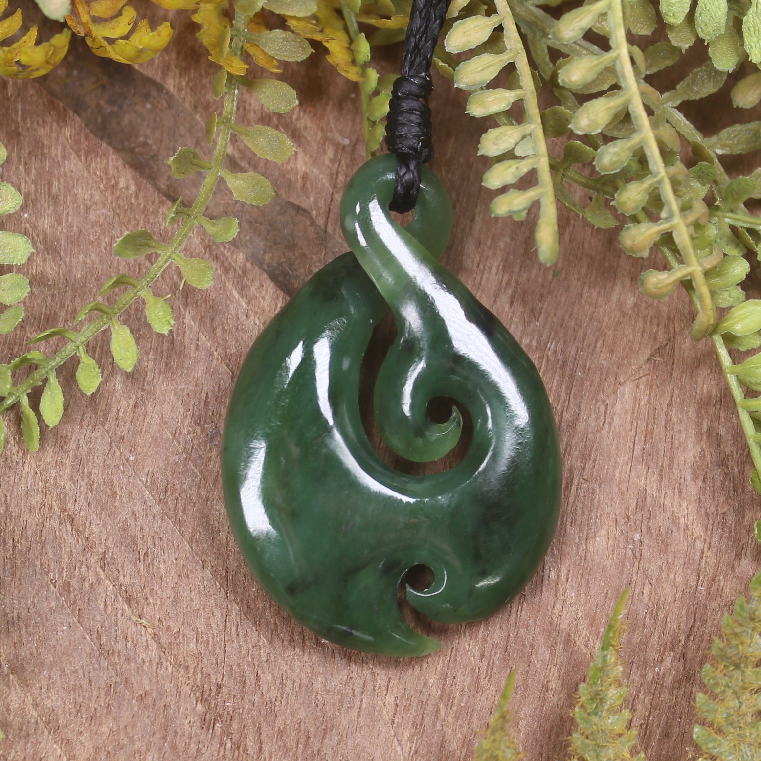 Koru Twist carved from Kawakawa Pounamu - NZ Greenstone