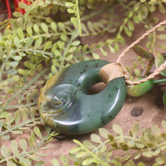 Porowhita with Koru carved from Flower Jade Pounamu - NZ Greenstone