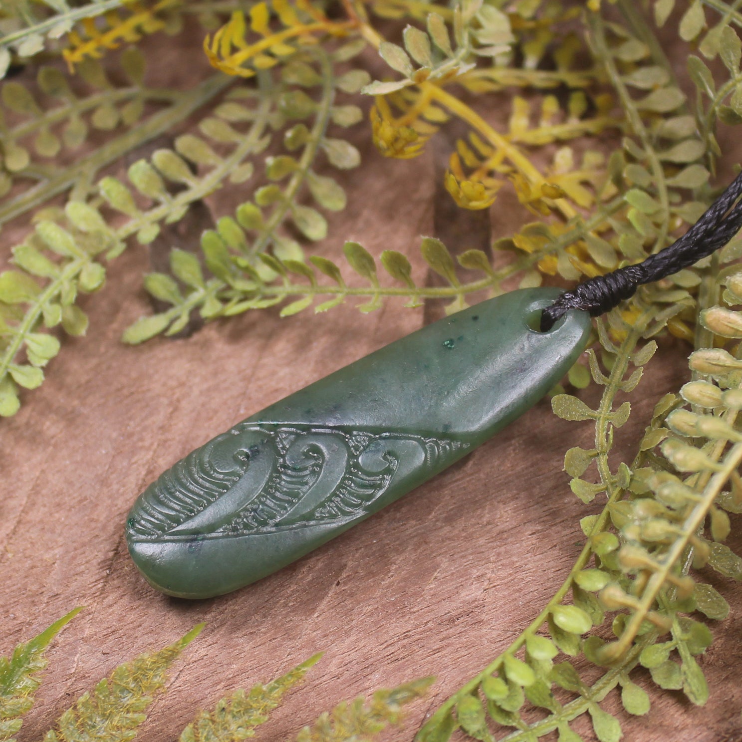 Roimata or Teardrop with Koru carved from Kawakawa Pounamu - NZ Greenstone