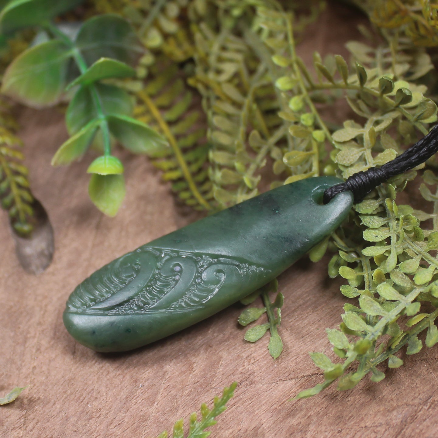 Roimata or Teardrop with Koru carved from Kawakawa Pounamu - NZ Greenstone