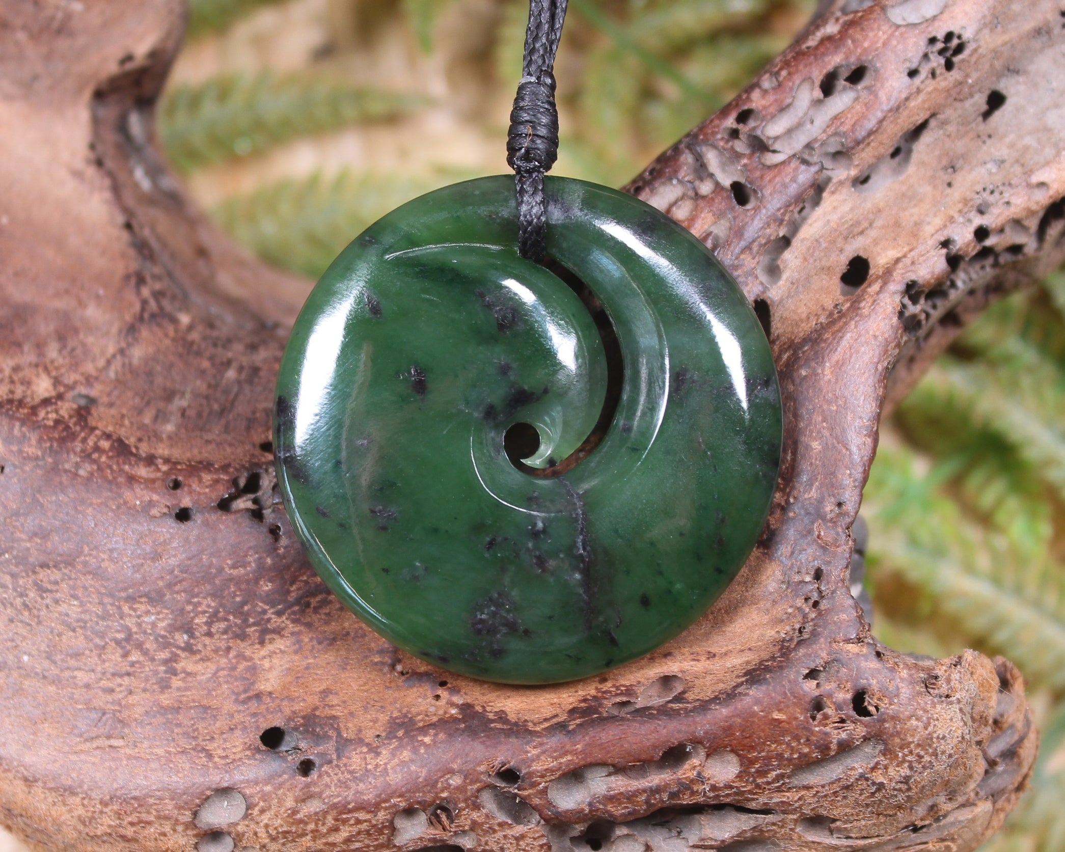 Koru carved from Rimu Pounamu - NZ Greenstone