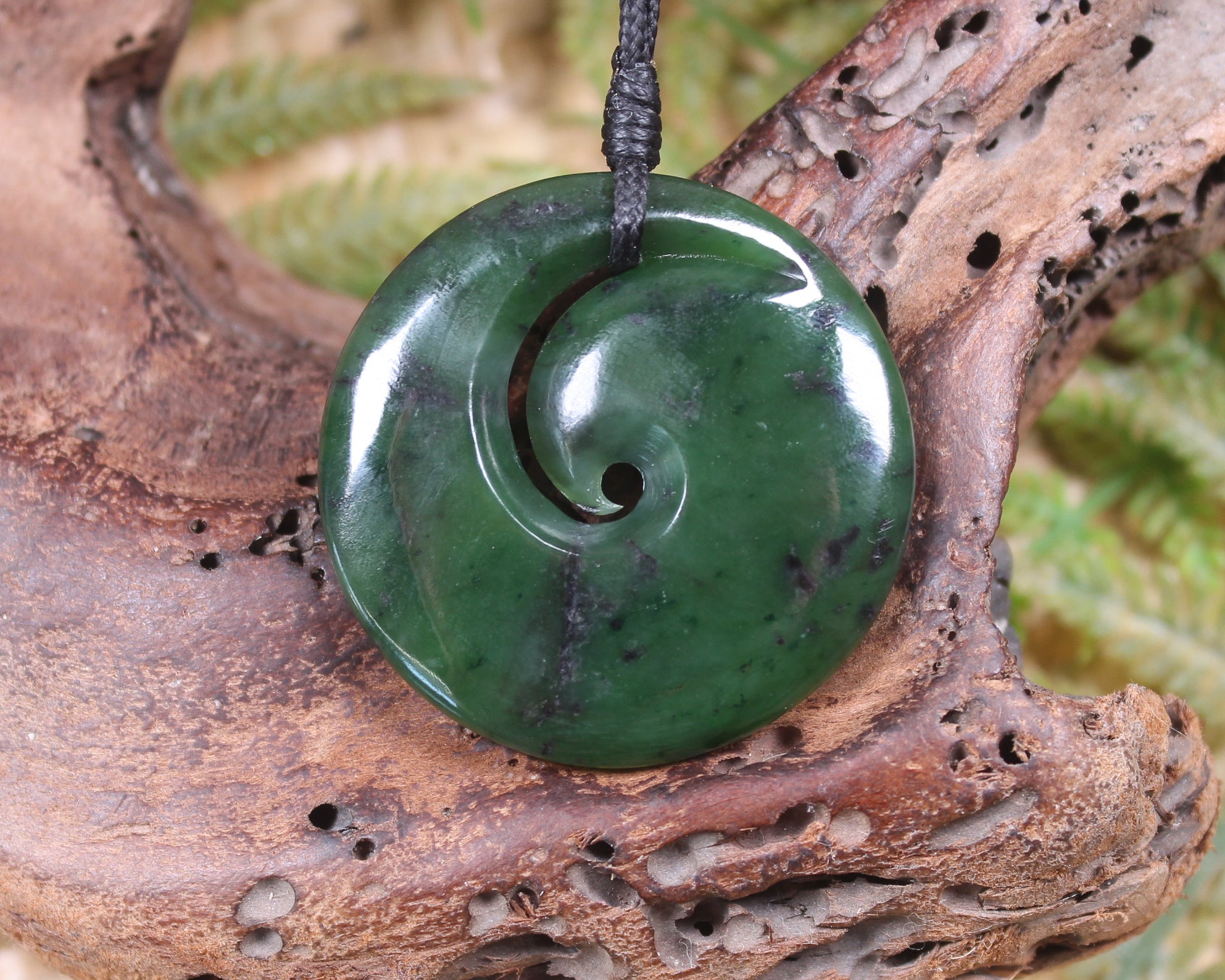 Koru carved from Rimu Pounamu - NZ Greenstone